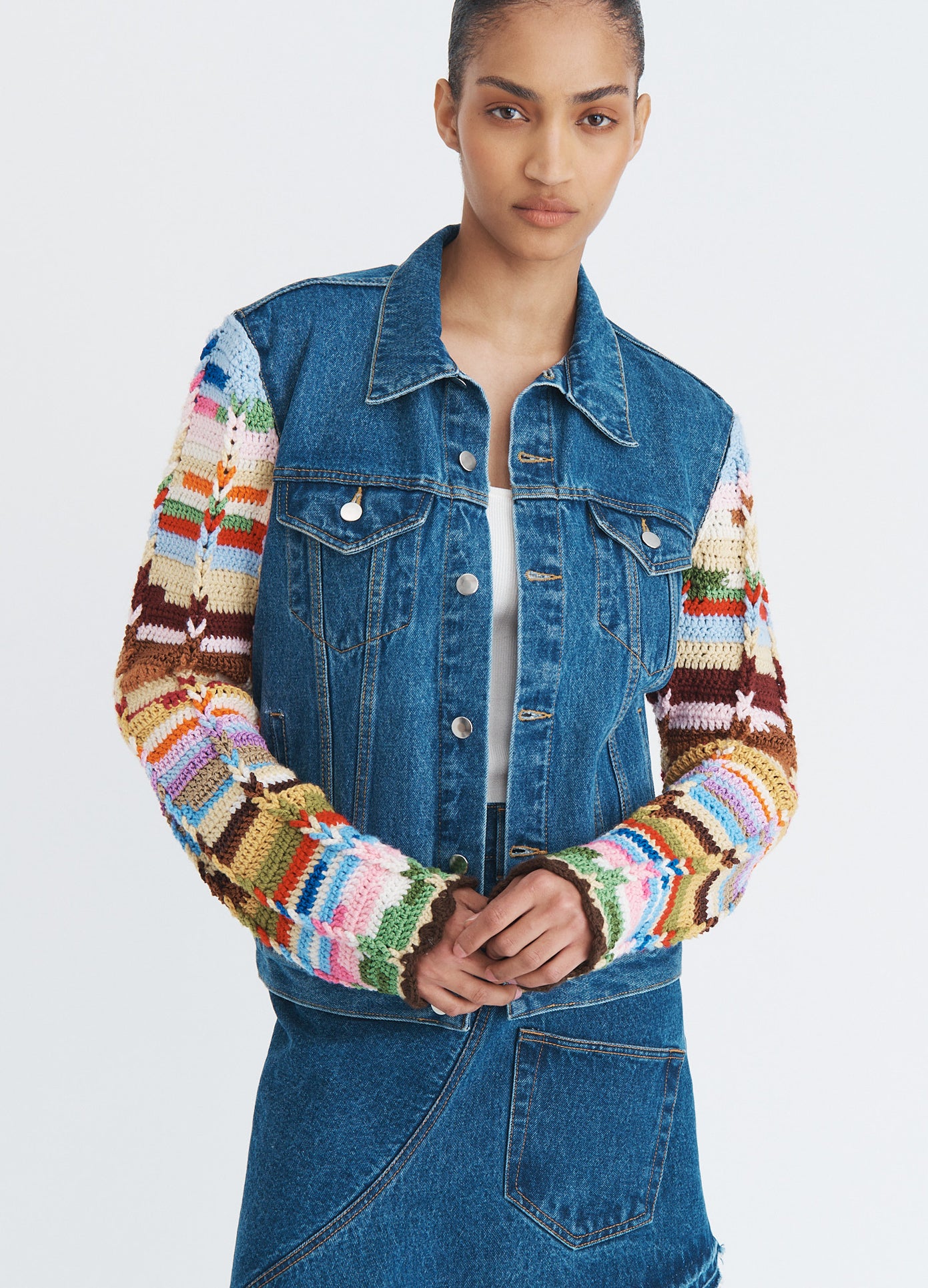 MONSE Crochet Sleeves Denim Jacket in indigo on model front view