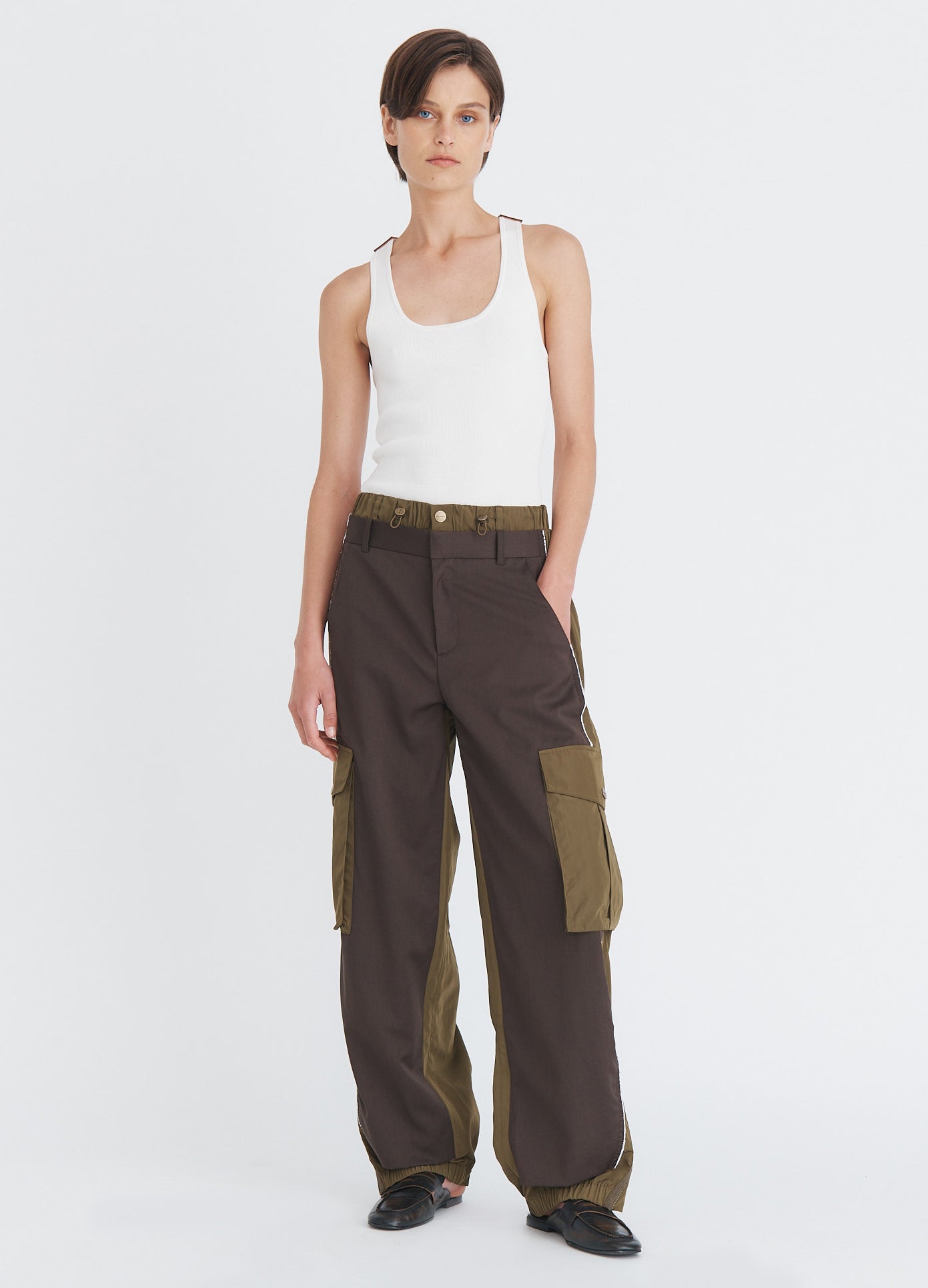 MONSE Deconstructed Combo Pants in olive and dark grey on model full front view