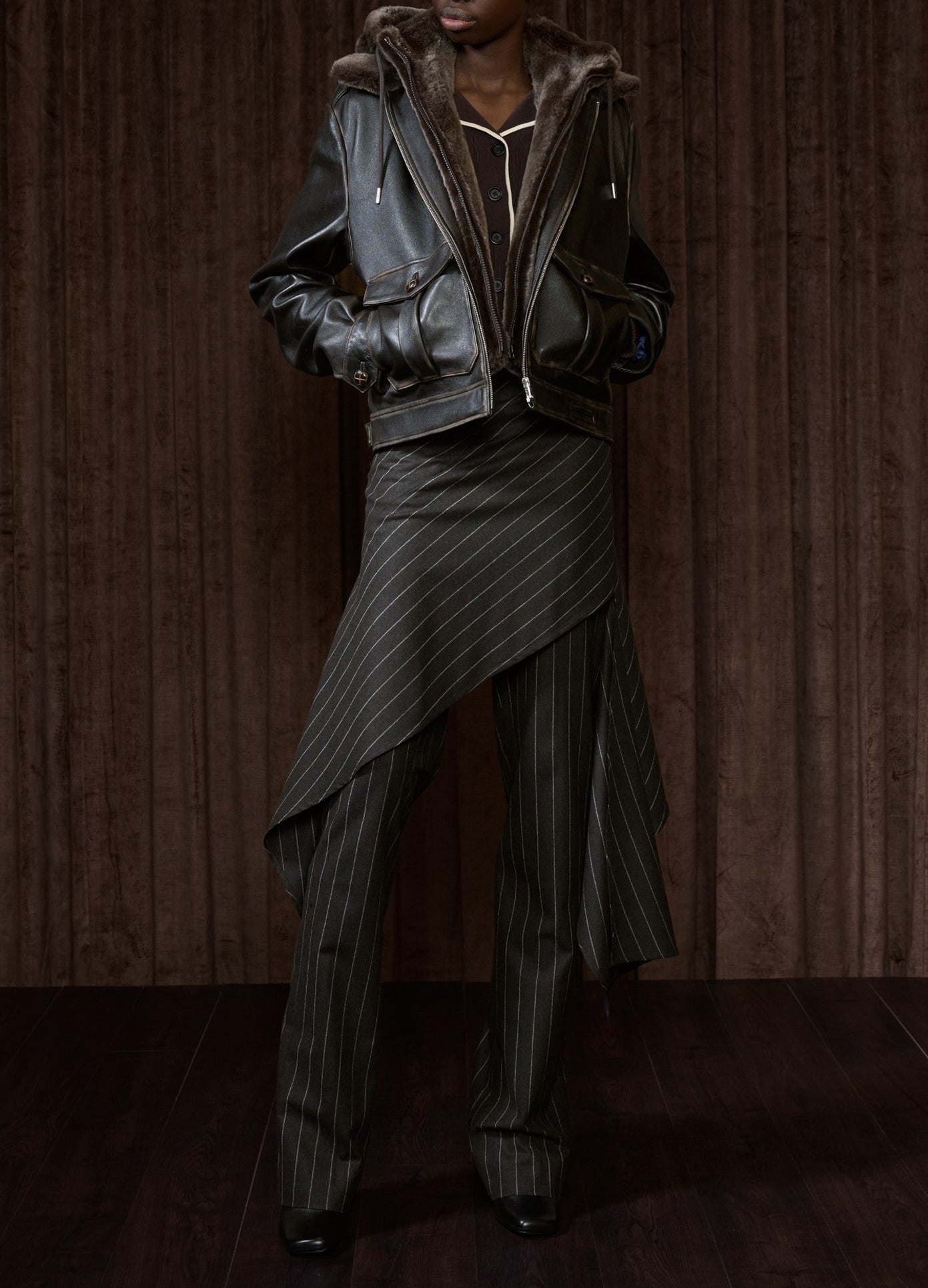 MONSE Deconstructed Tailored Skirt Trousers in brown on runway model full front view