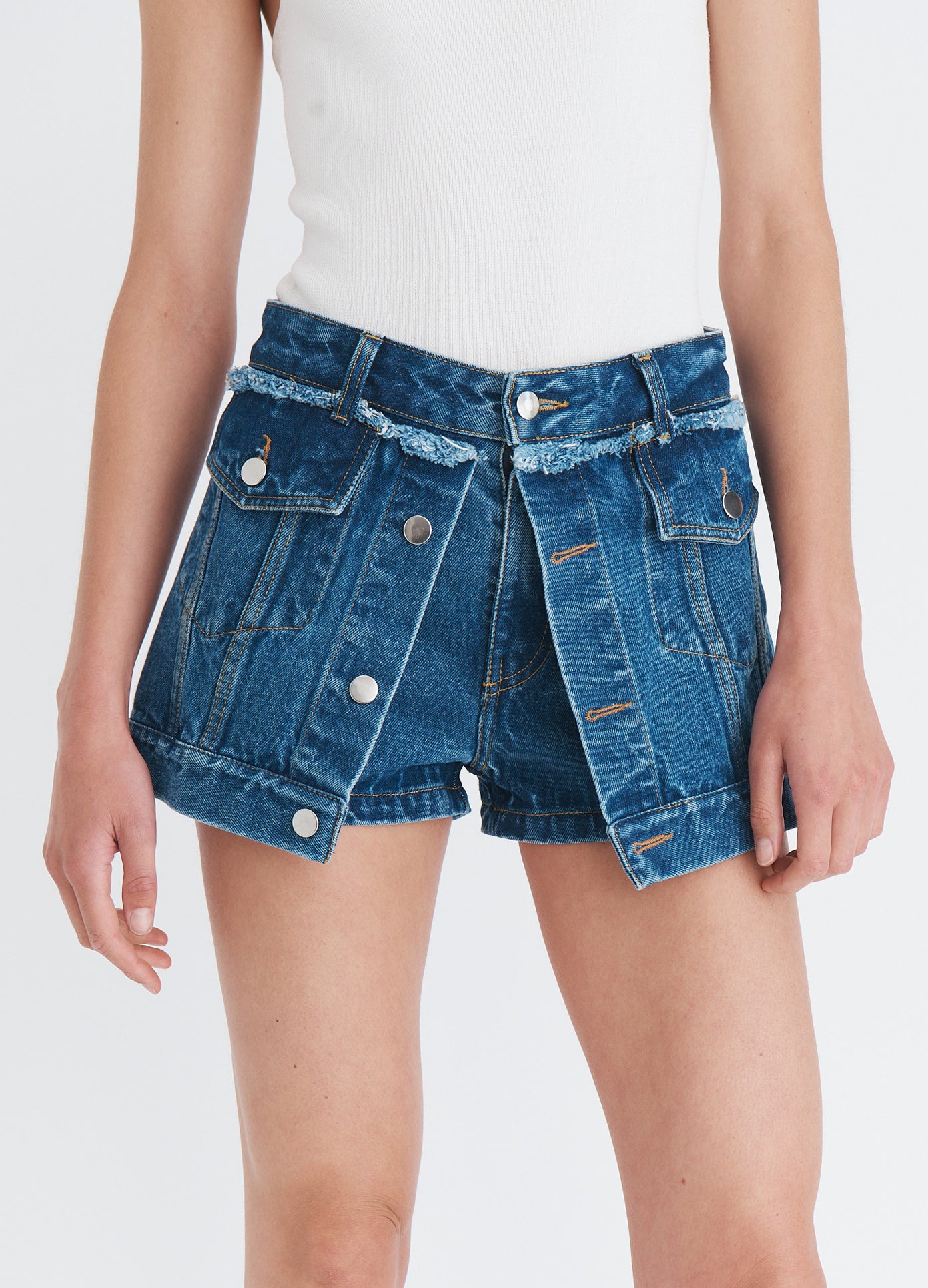 MONSE Denim Jacket Front Shorts in indigo on model front detail view