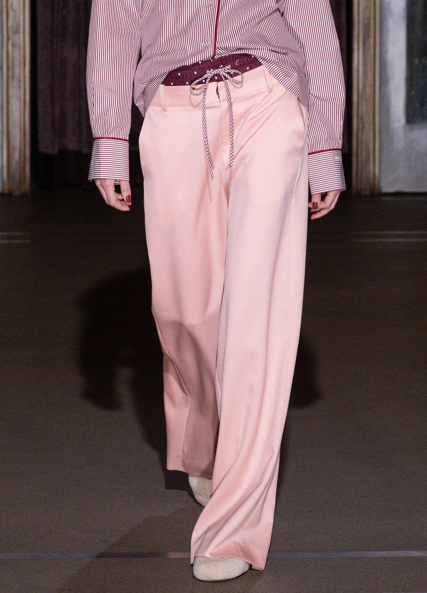 MONSE Double Waistband Trousers in pink on model walking runway