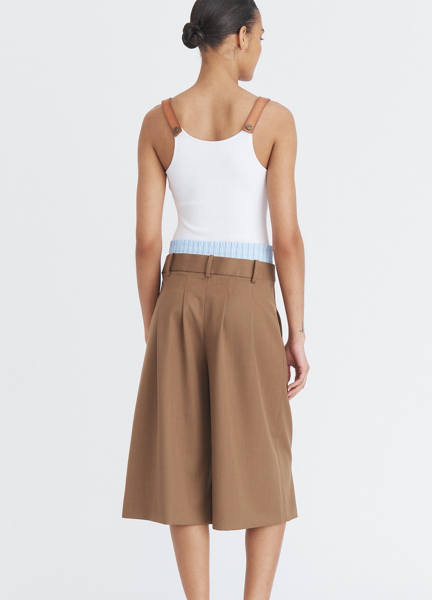 MONSE Double Waistband Wide Leg Shorts in beige on model back view