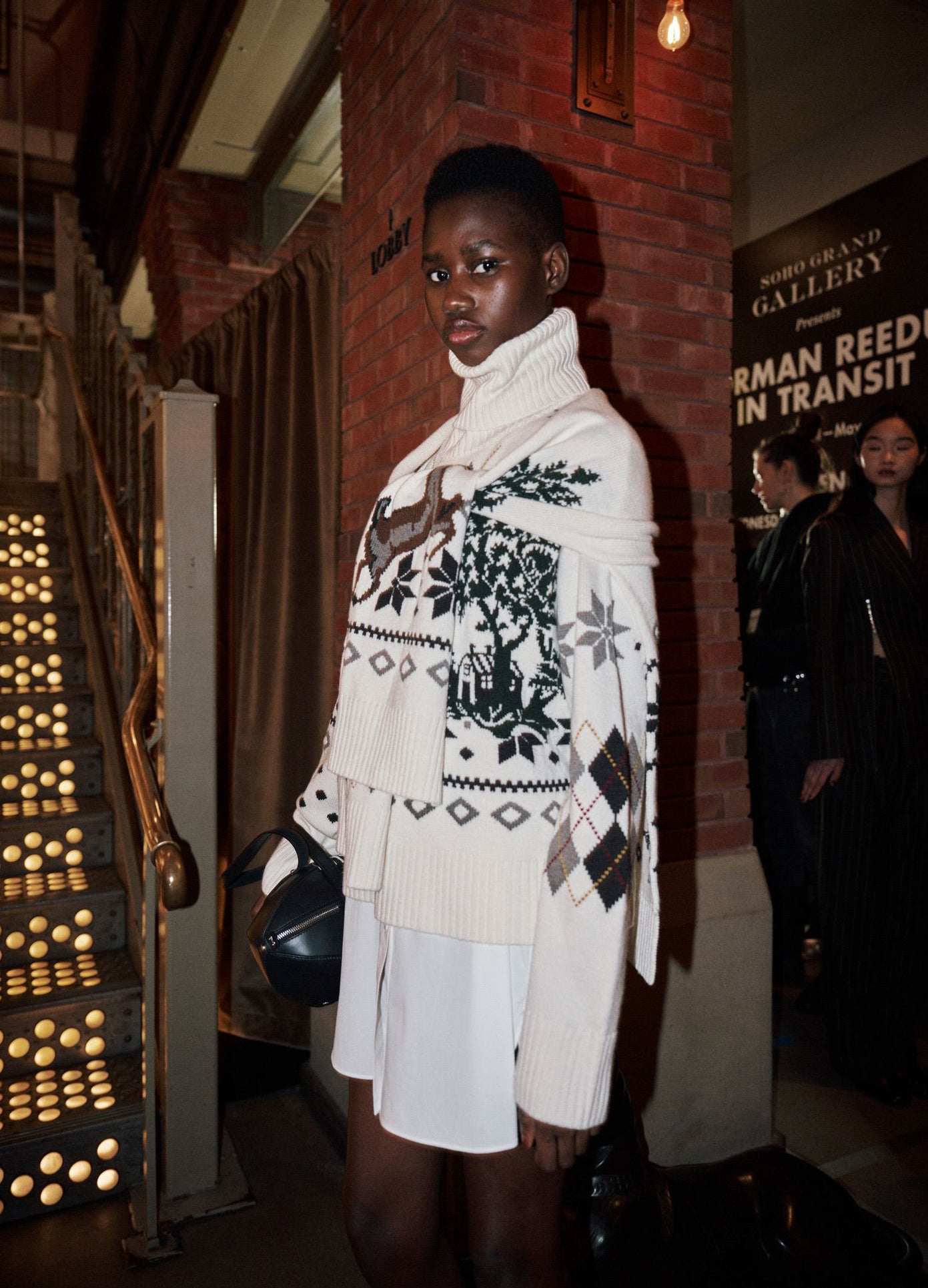 MONSE Fair Isle Roll Neck With Scarf in ivory on model backstage side view