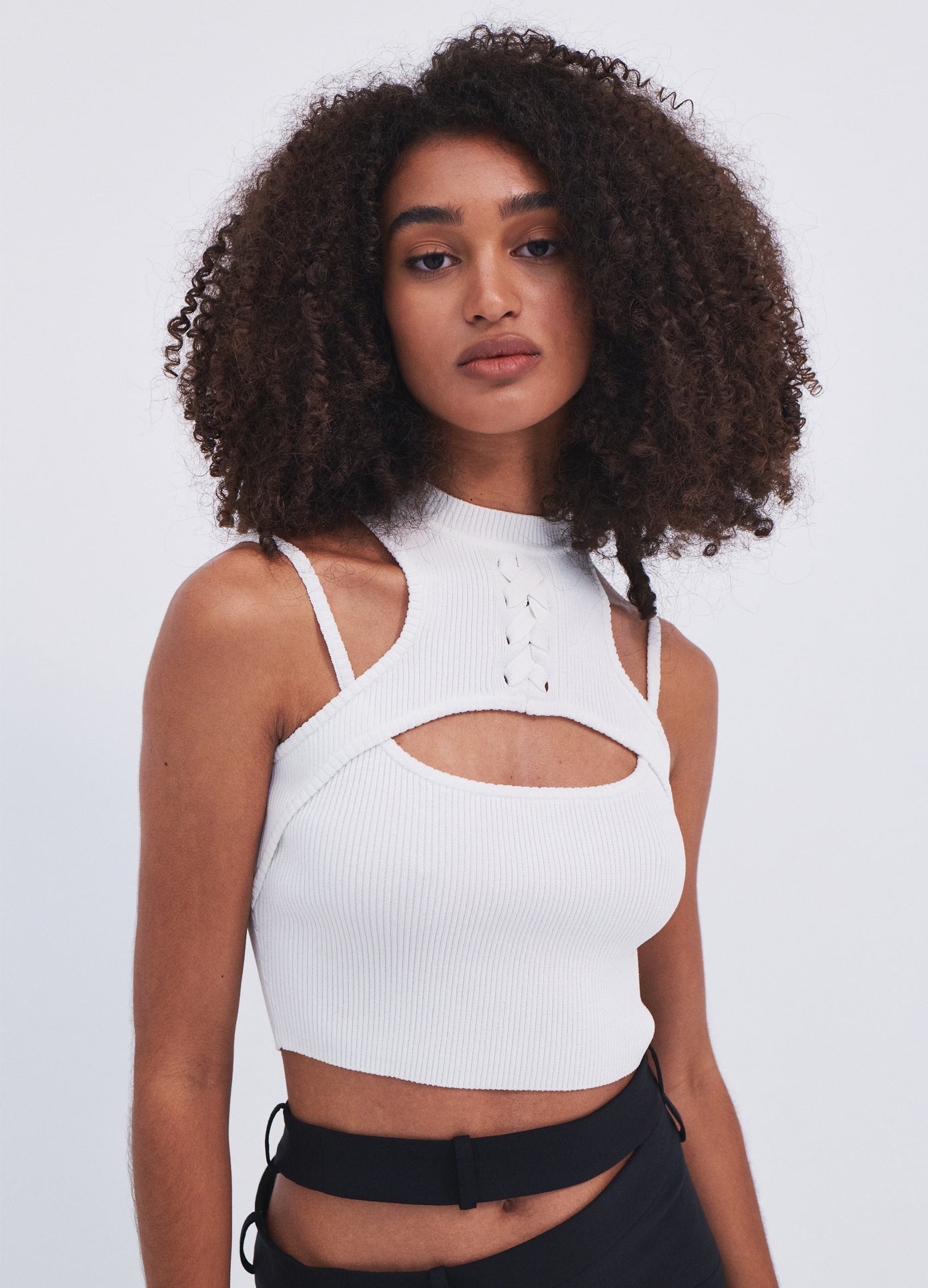 MONSE Halter Neck Knit Cropped Top in Ivory on model front view