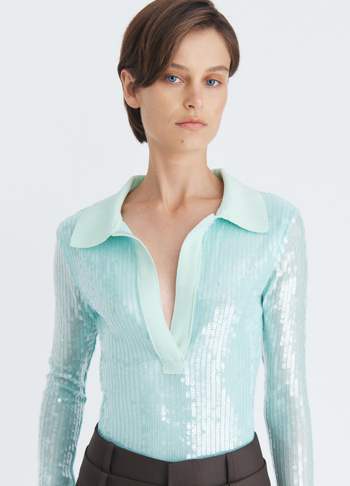 MONSE Knit Collar Sequin Polo in seafoam on model front detail view