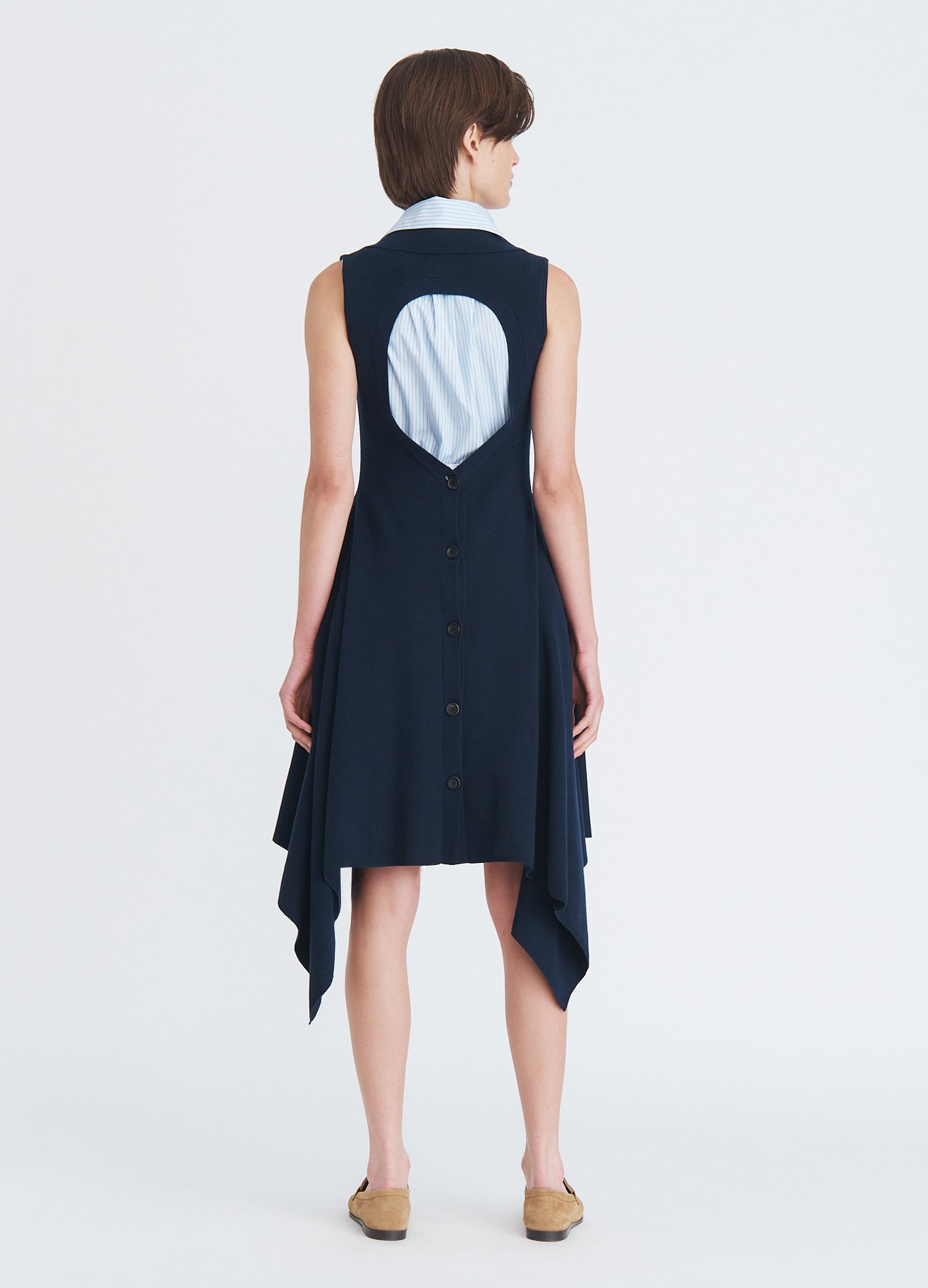 MONSE Napkin Hem Backless Knit Top in navy on model full back view