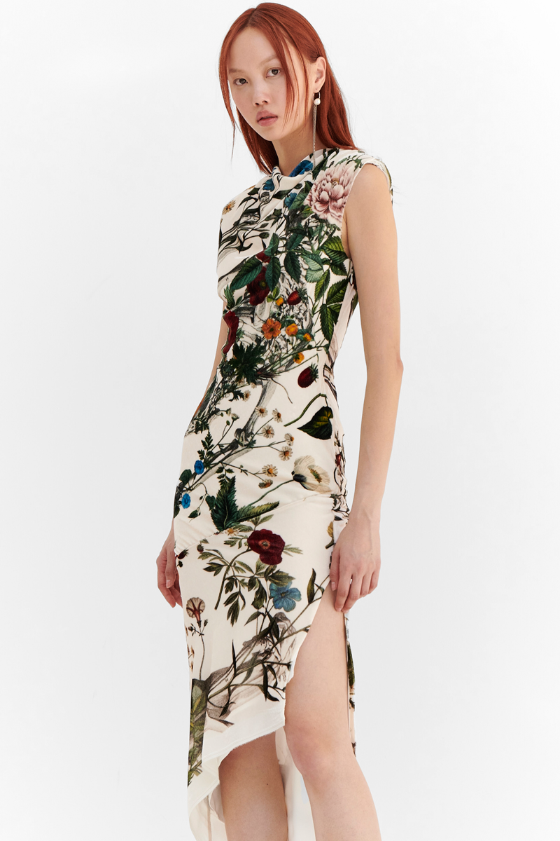 MONSE Resort 2024 Collection Vogue image of model wearing a long sleeveless floral print dress