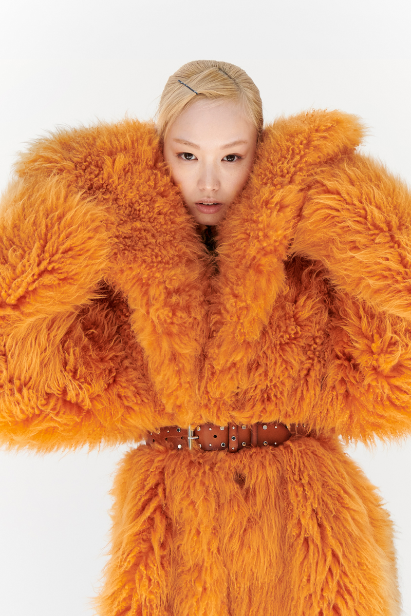 MONSE Resort 2024 Collection Vogue image of model wearing a faux fur coat