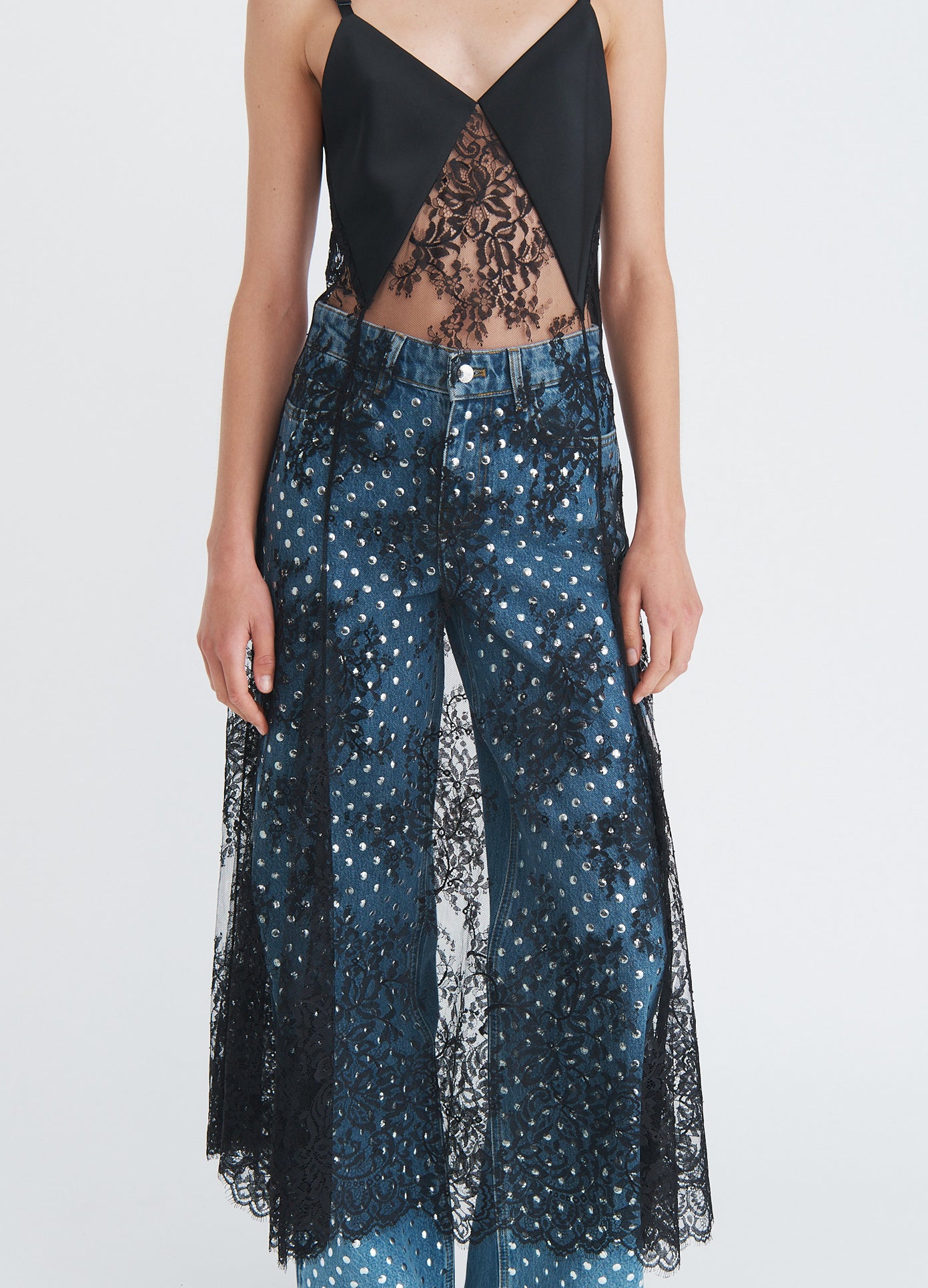 MONSE Sheer Lace Slip Dress in black on model front bottom view