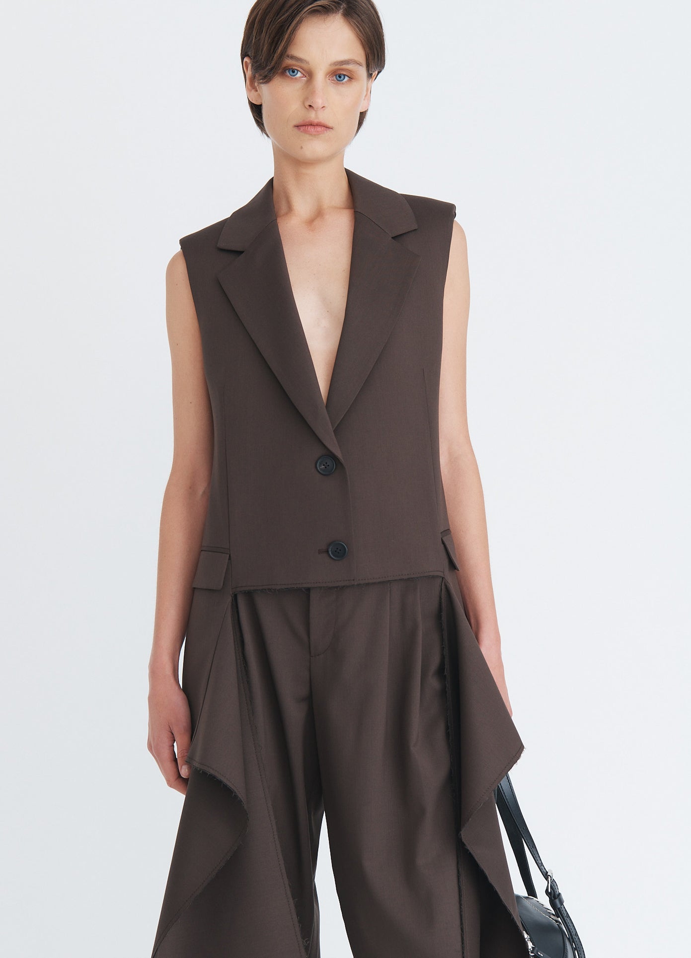 MONSE Sleeveless Fly-Away Jacket in olive brown on model front view