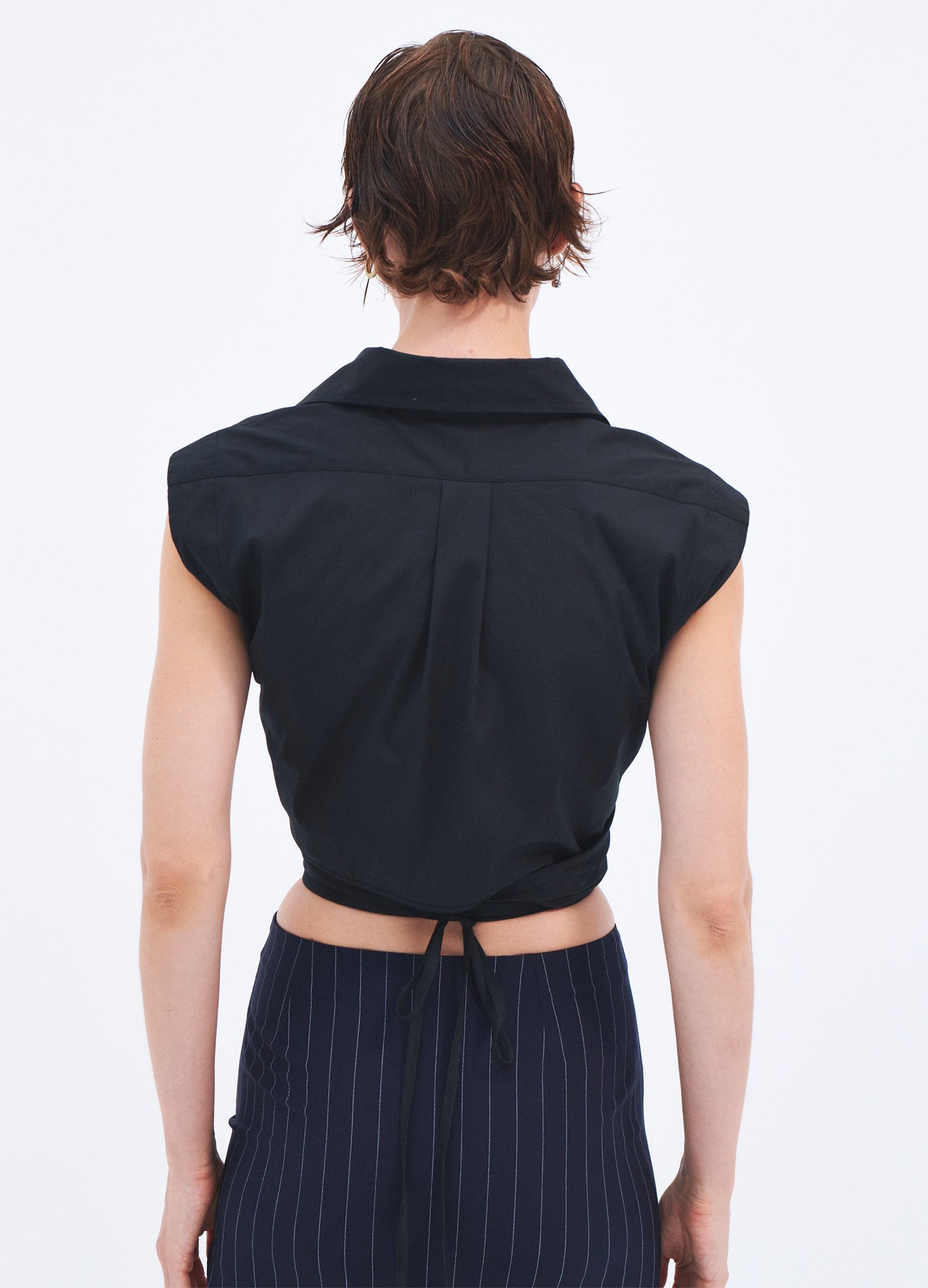 MONSE Spring 2024 Sleeveless Draped Shirt in Black on model back view