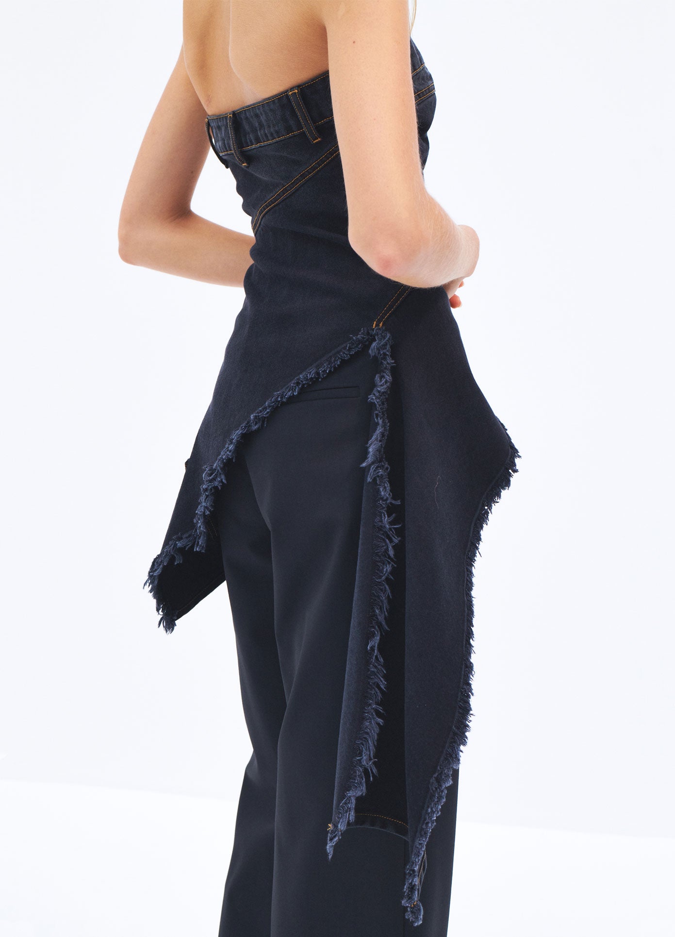 MONSE Spring 2024 Twisted Denim Top in Black on model side view