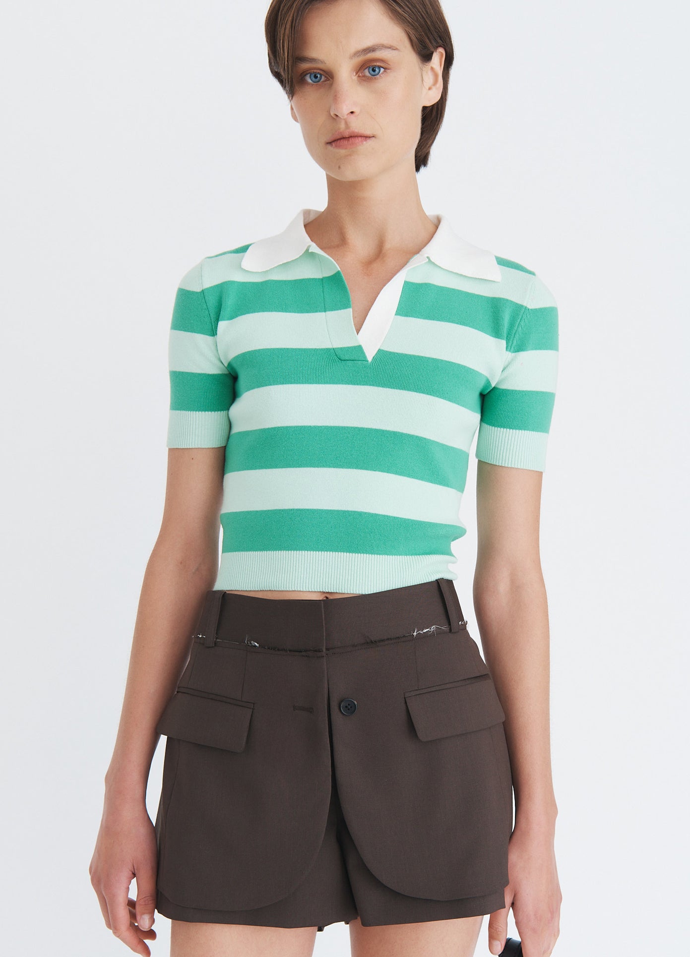 MONSE Striped Knit Polo Top in green on model front view