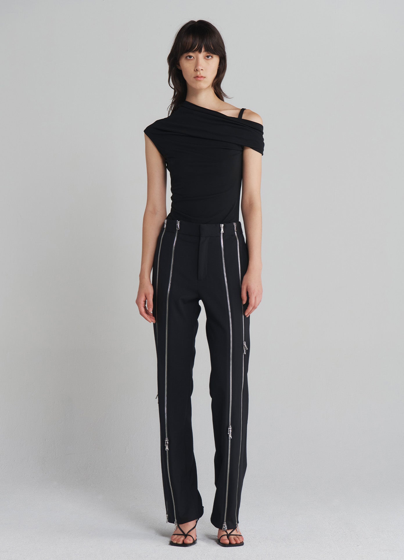 MONSE Zippered Tailored Trousers in Black on model full front view