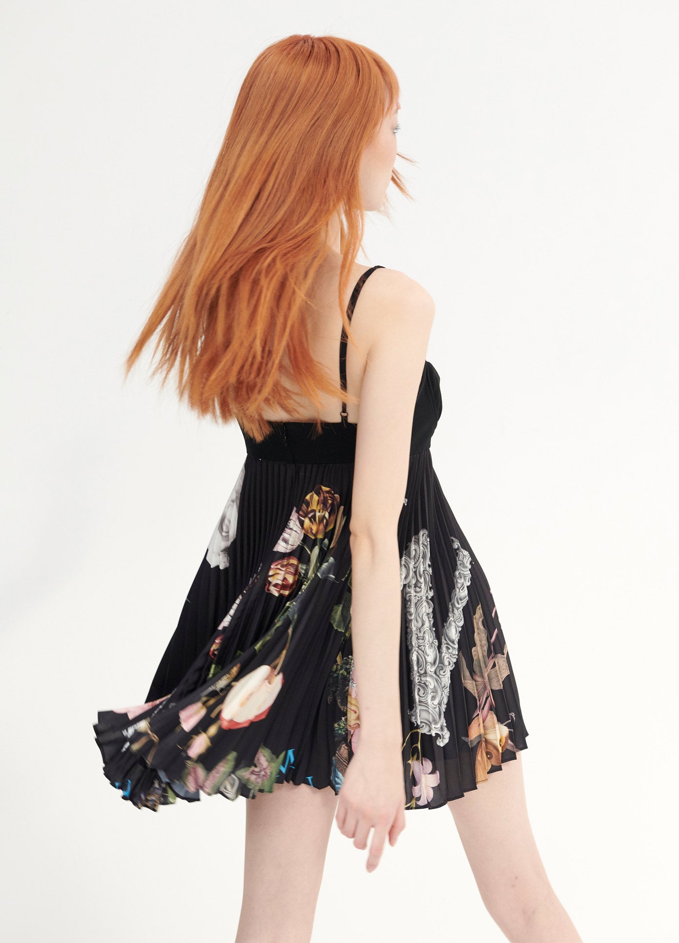 MONSE Pleated Baby Doll in Black Print on Model Swaying Back View