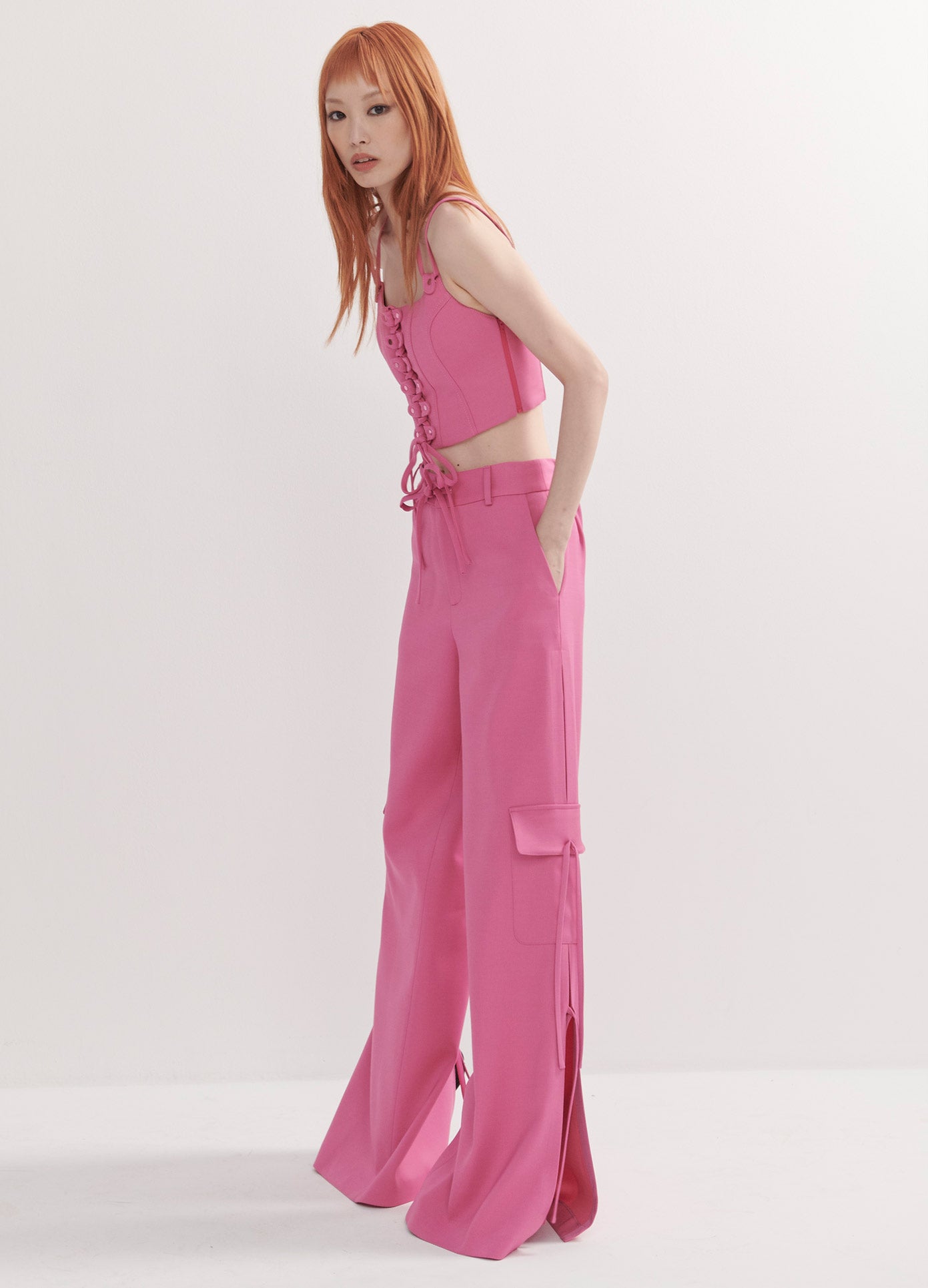 MONSE Side Slit Cargo Pants with Chain in Pink on Model Full Side View