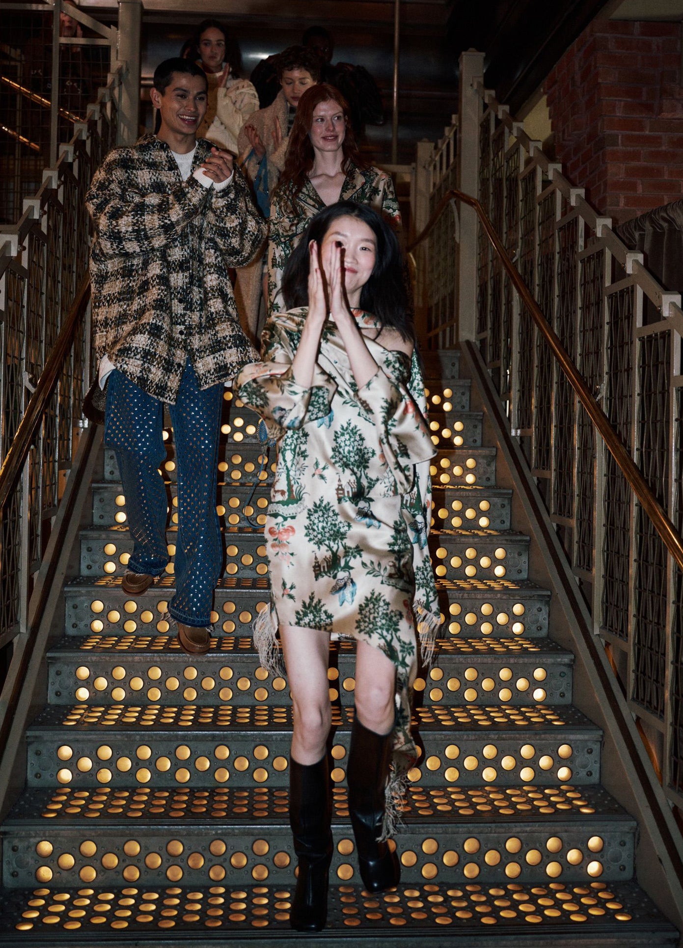 MONSE Asymmetric Hem Scarf Dress in multi on model walking down stairs at runway show