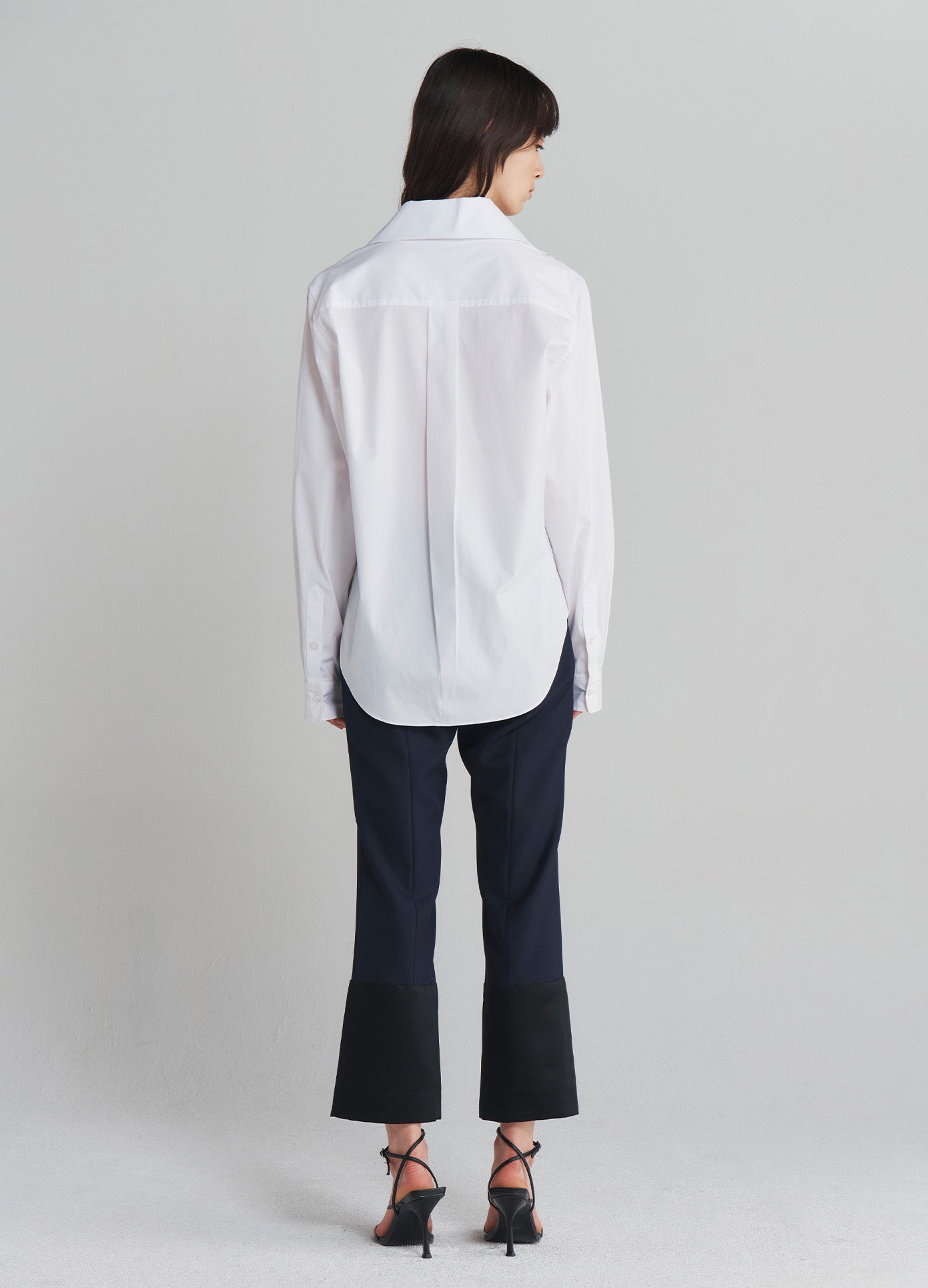 MONSE Asymmetrical Collar Shirt in Ivory on model full back view