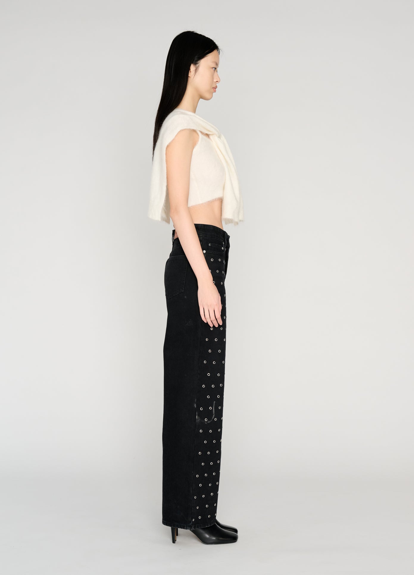 MONSE Black Denim Jean With Grommets on model full side view