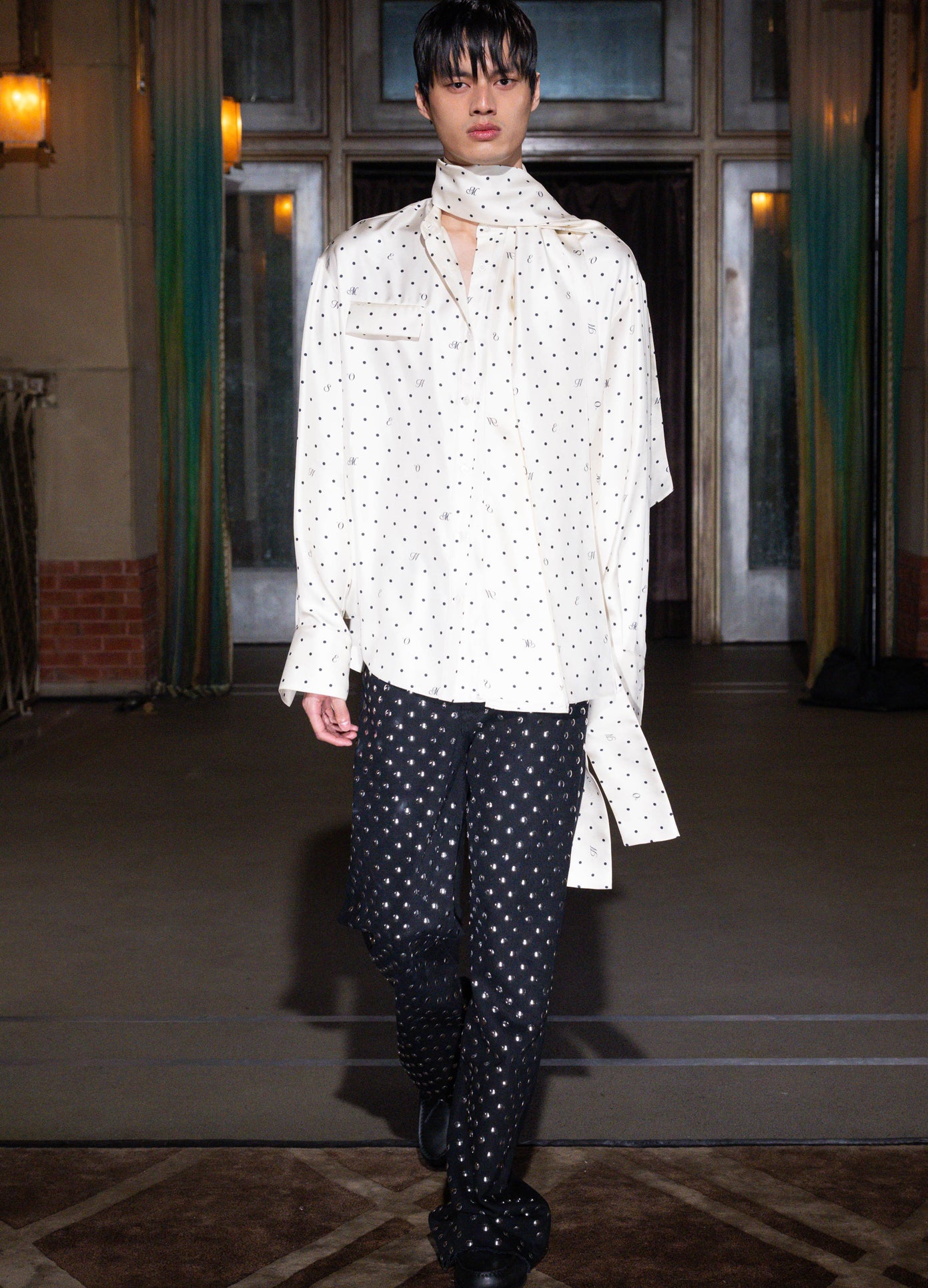 MONSE Black Denim Jean With Grommets on runway model walking show full front view