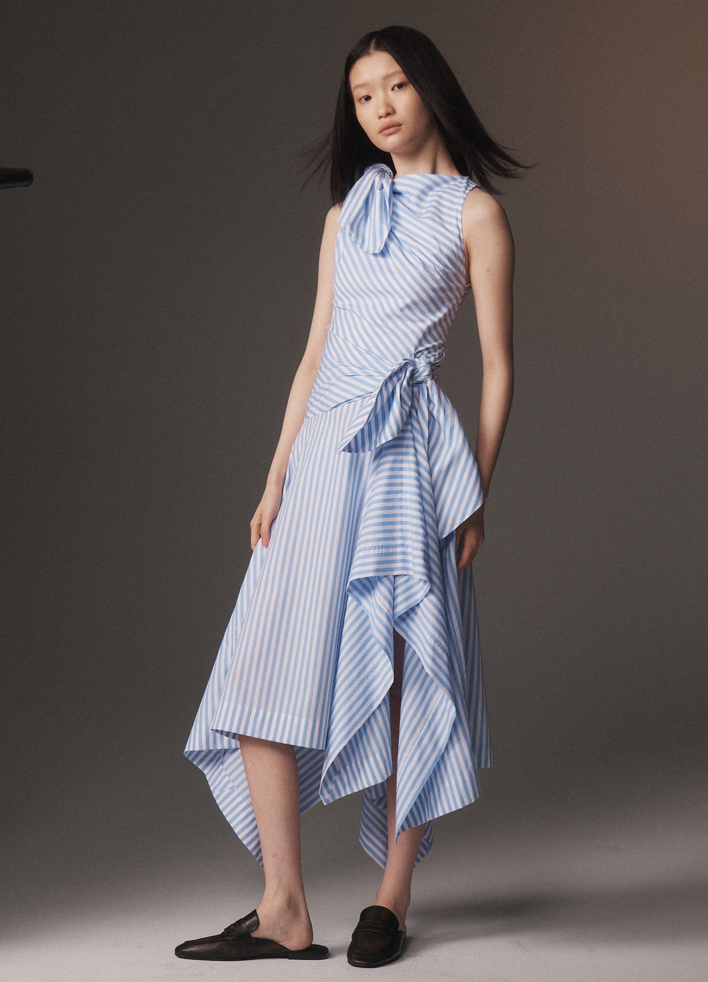 MONSE Bow Drape Shirting Cascade Dress in sky blue on model lookbook image