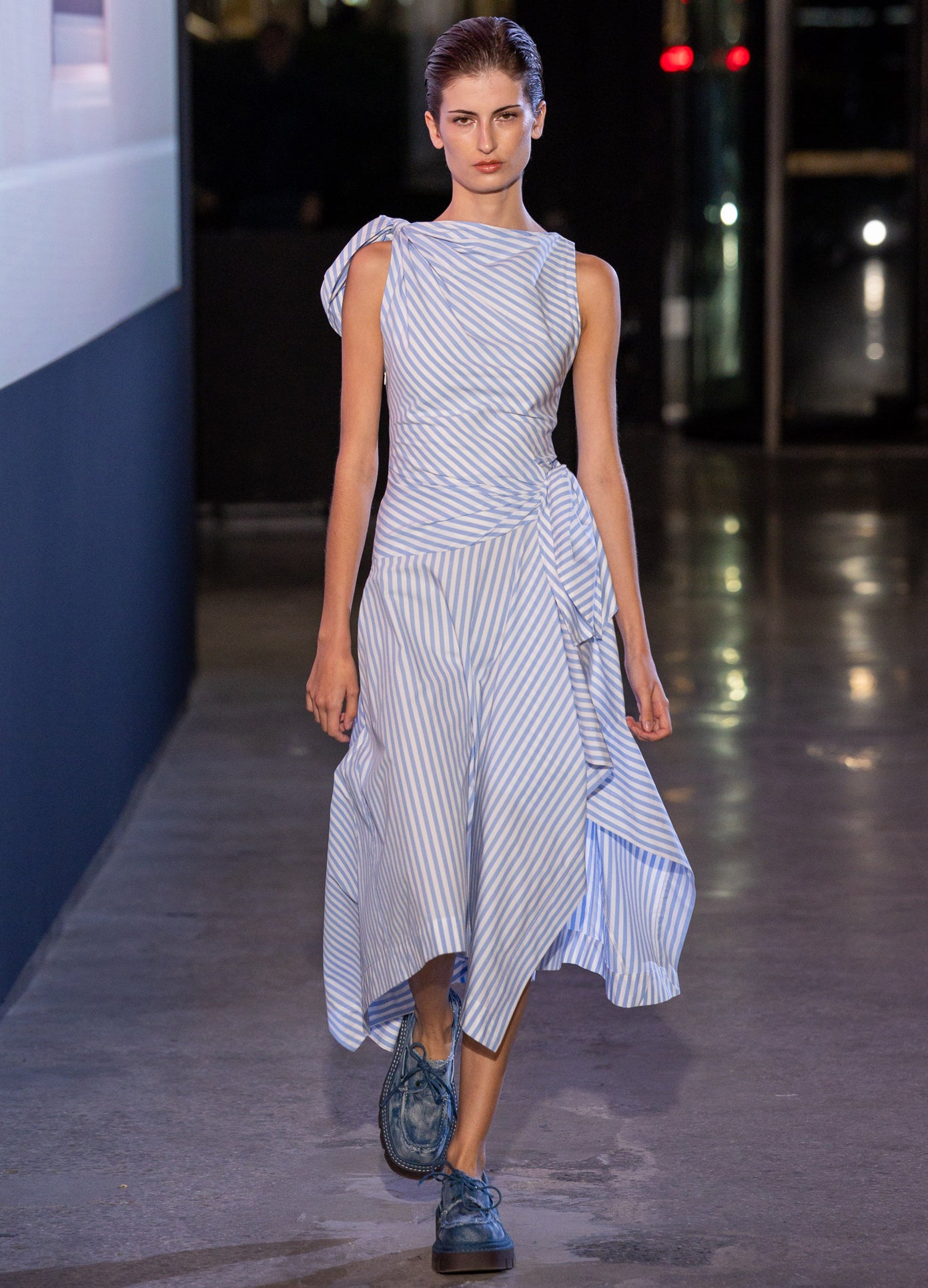 MONSE Bow Drape Shirting Cascade Dress in sky blue on model walking runway