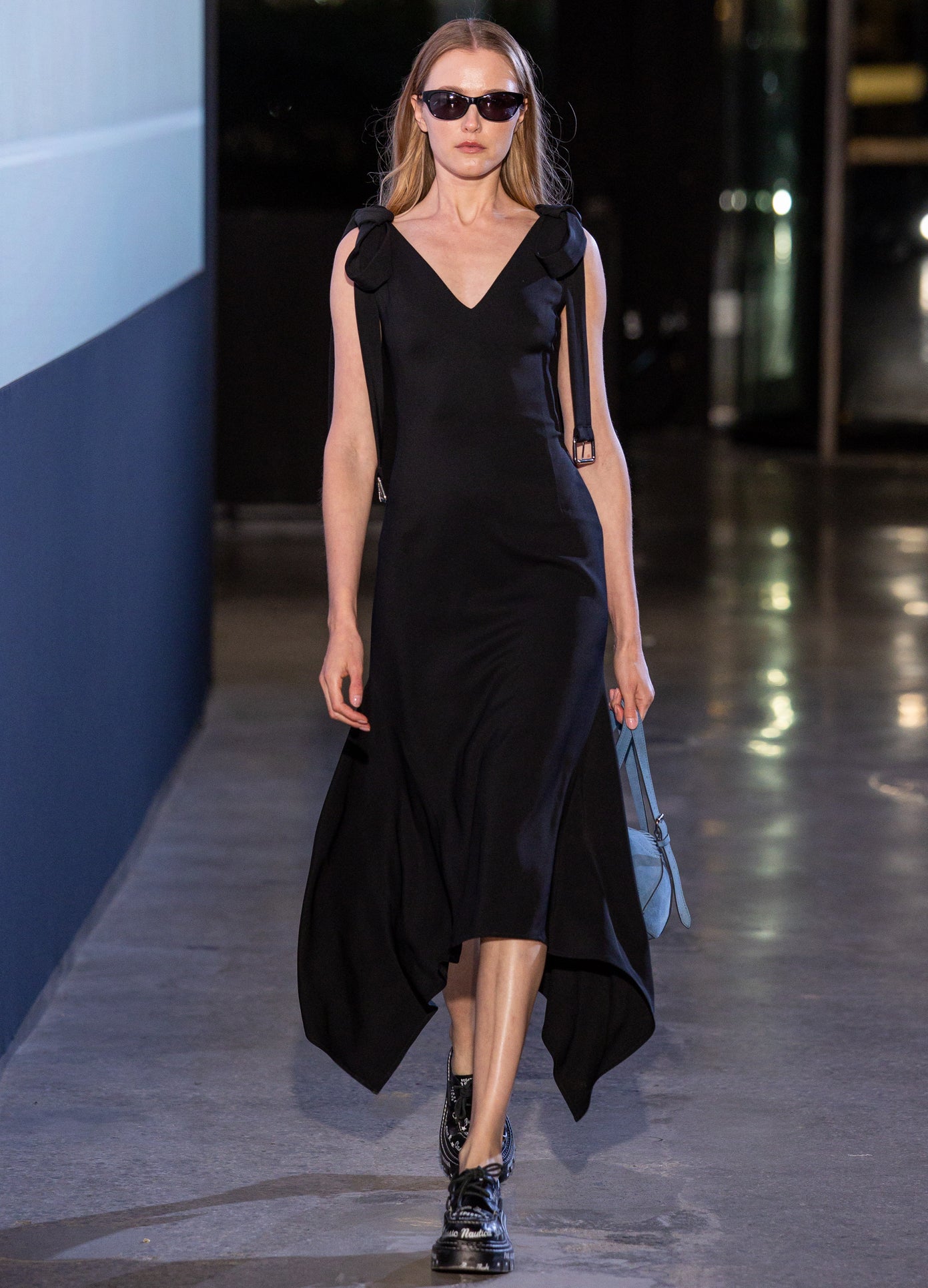 MONSE Buckled Bow Tie Midi Dress in black on model walking runway