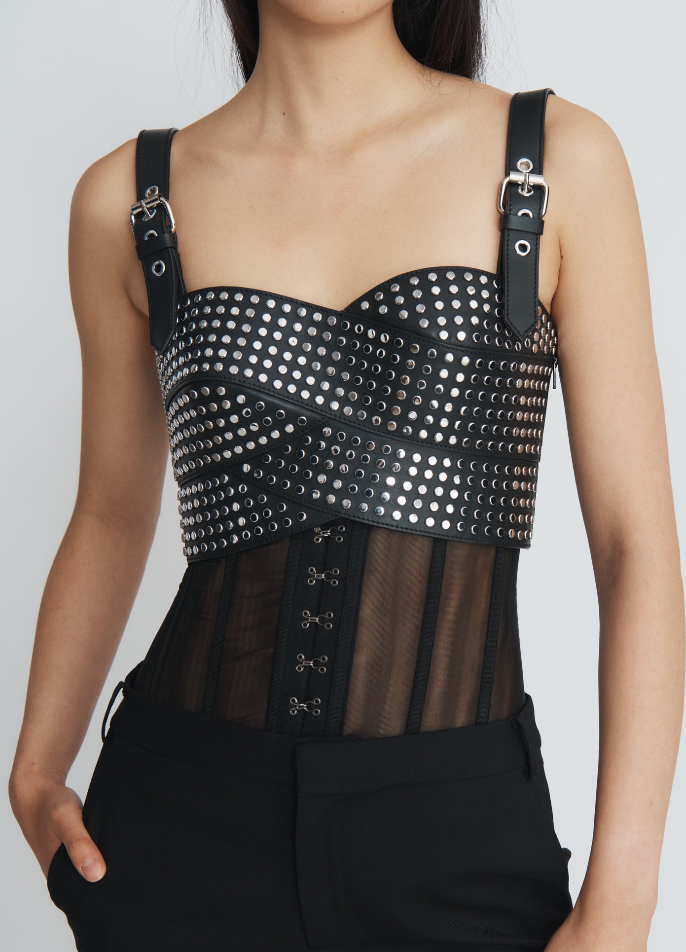 MONSE Bustier Trousers in black on model front top view