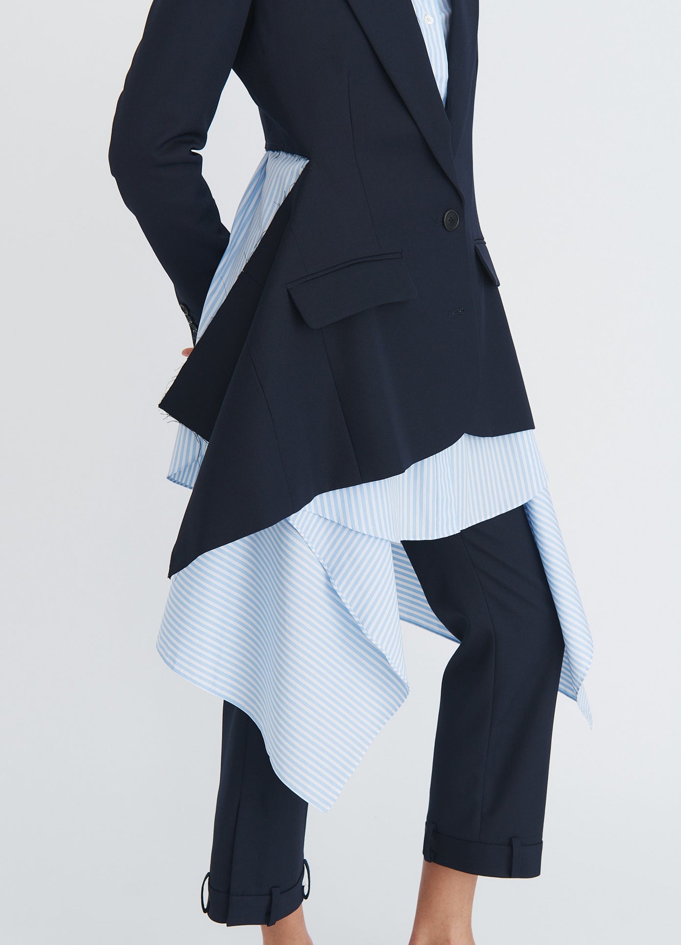 MONSE Cascade Slashed Tailored Jacket in navy on model side detail view