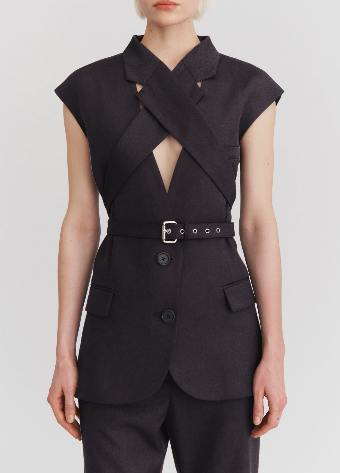 MONSE Criss Cross Belt Tailored Vest in Black on model front detail view