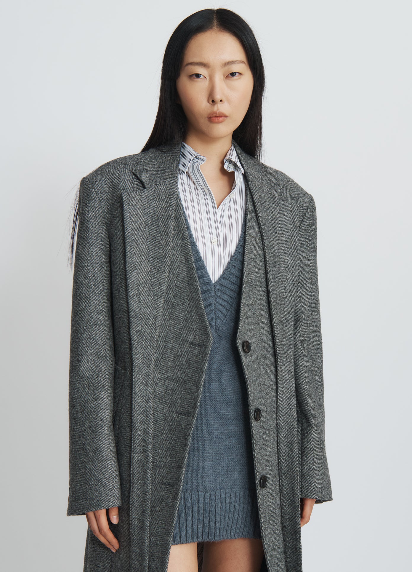 MONSE Criss Cross Lapel Coat in charcoal on model front view