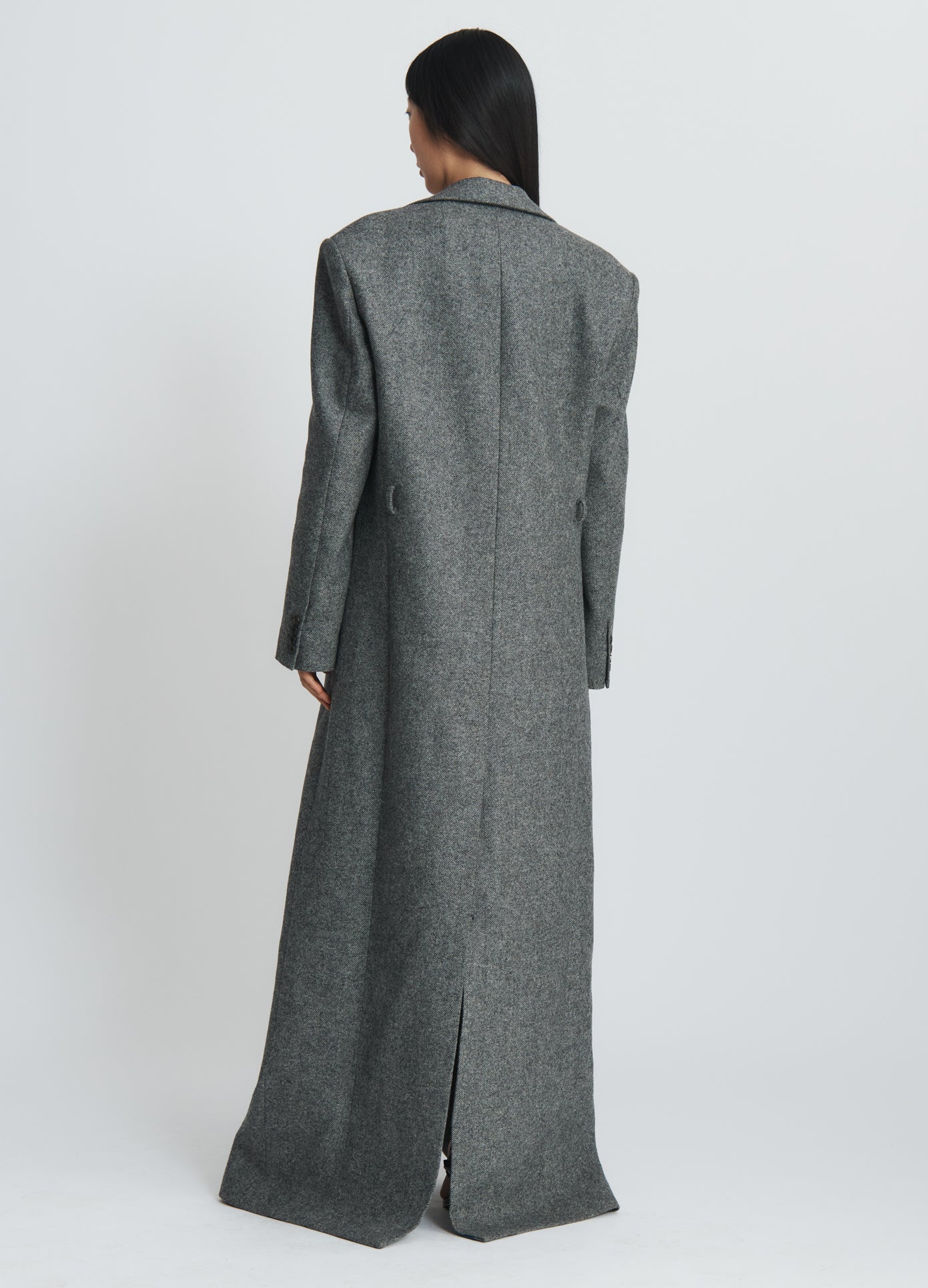 MONSE Criss Cross Lapel Coat in charcoal on model full back view