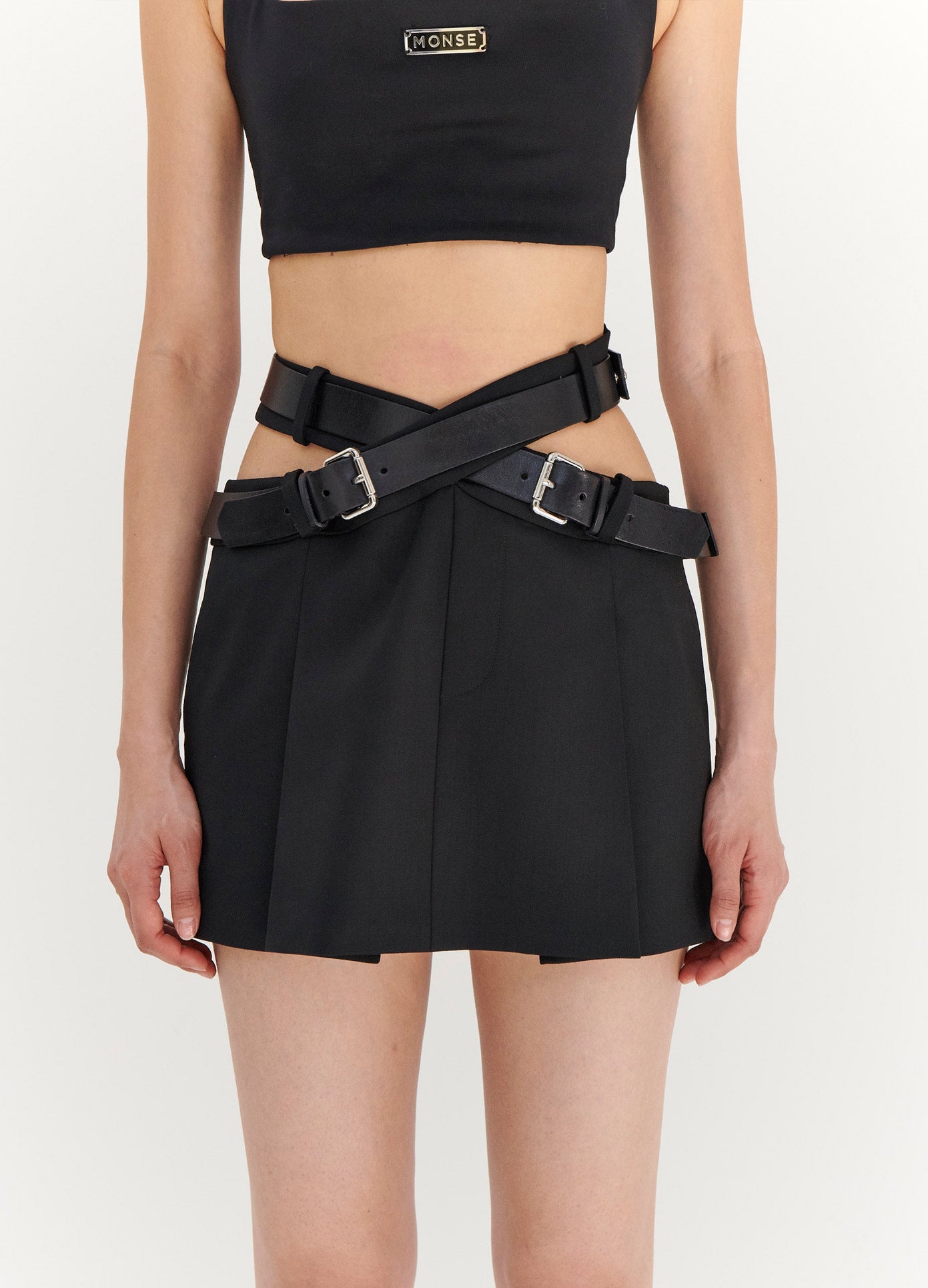 MONSE Criss Cross Waist Belted Mini Skirt in Black on Model Front View