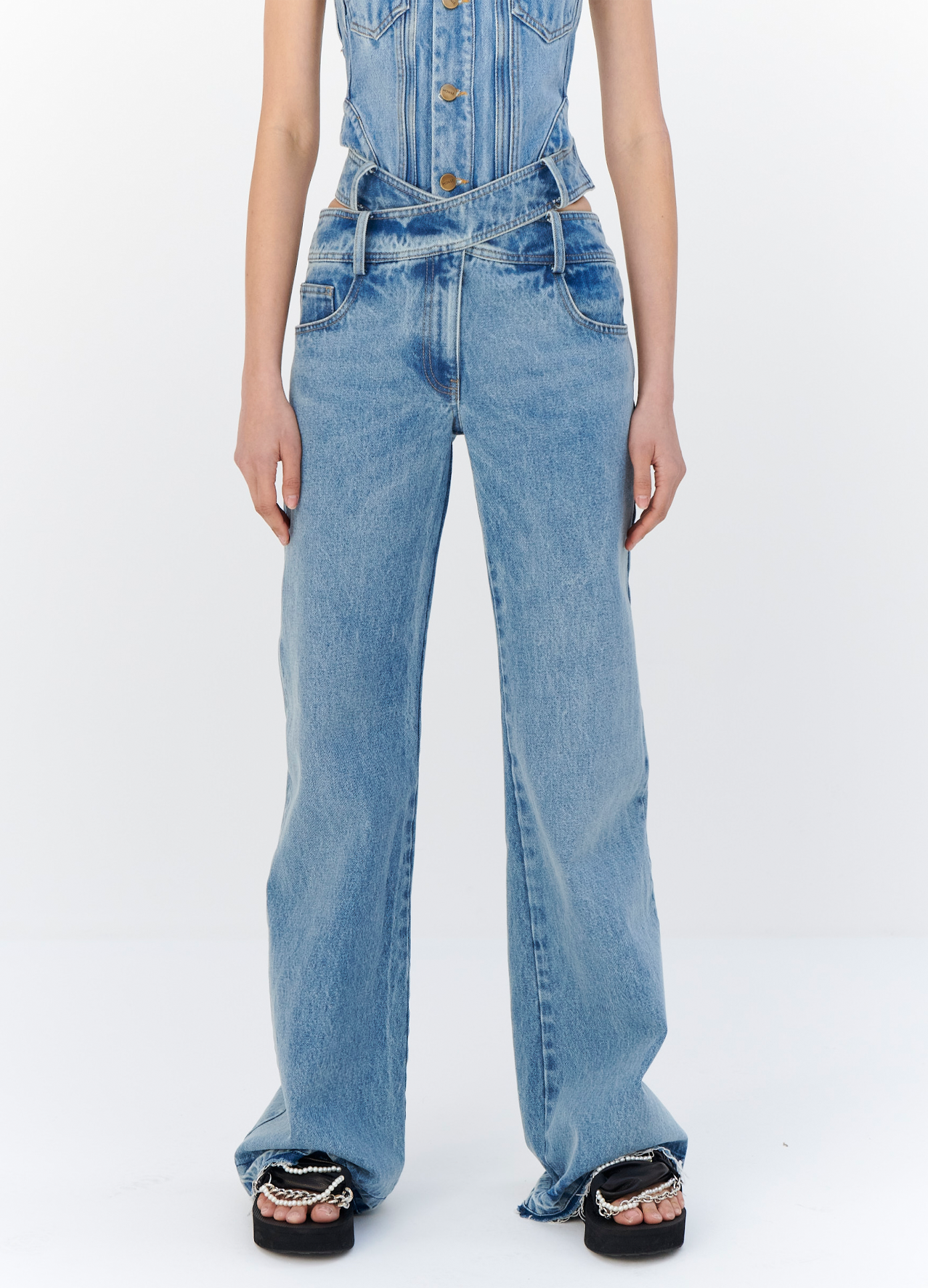 MONSE Criss Cross Waist Jeans in Indigo on model front detail view