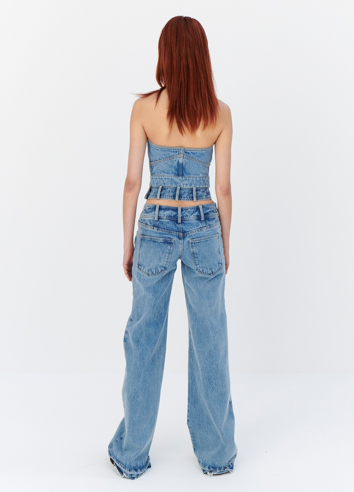 MONSE Criss Cross Waist Jeans in Indigo on model full back view