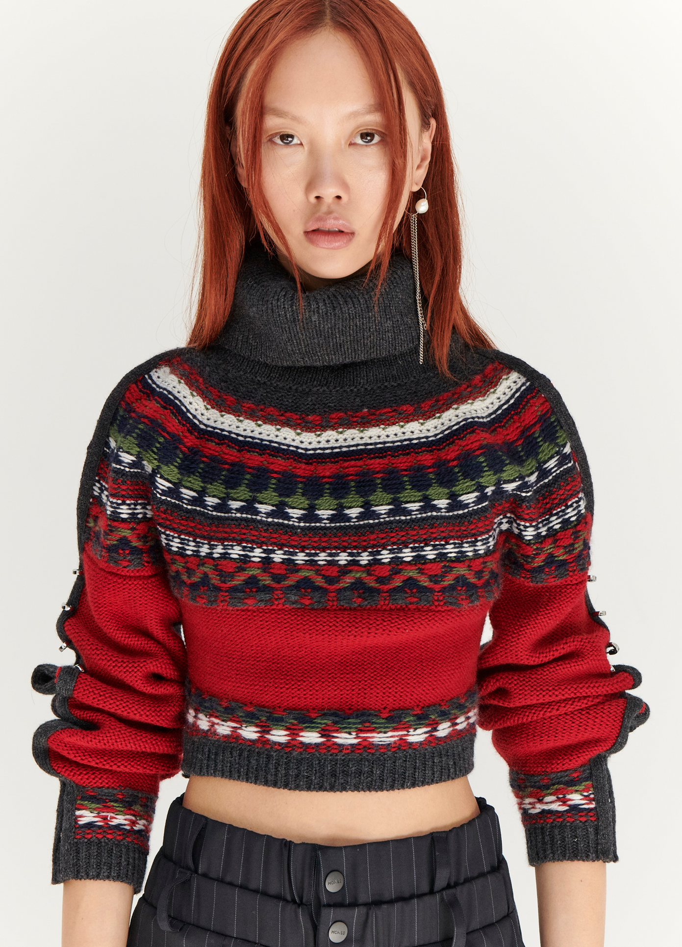 MONSE Cropped Fairisle Turtleneck Sweater  in Red and Charcoal on model front view