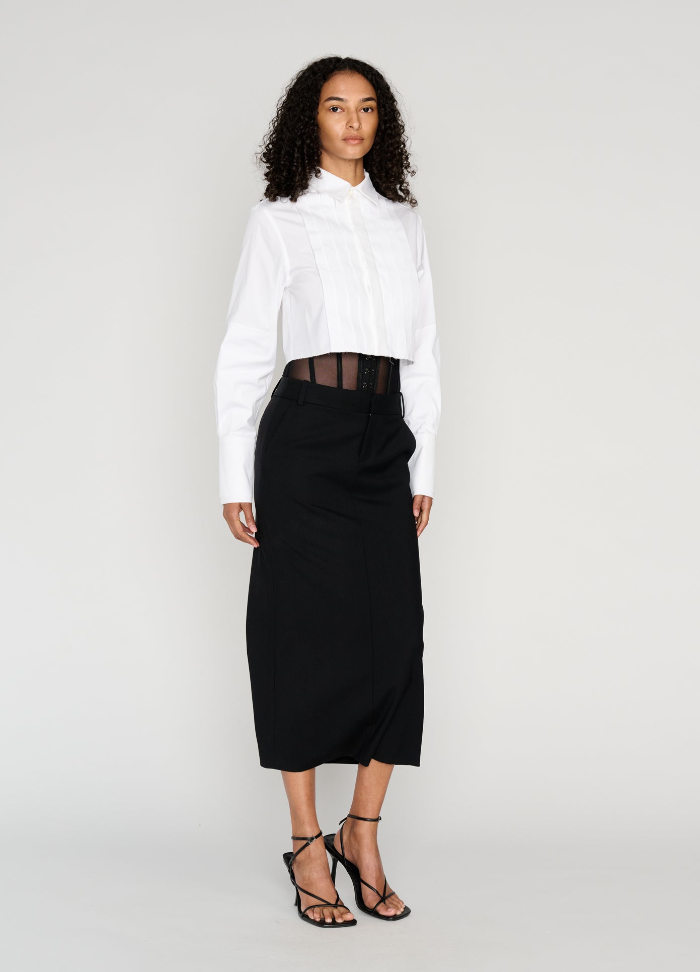 MONSE Cropped Tuxedo Shirt in ivory on model angled full front view