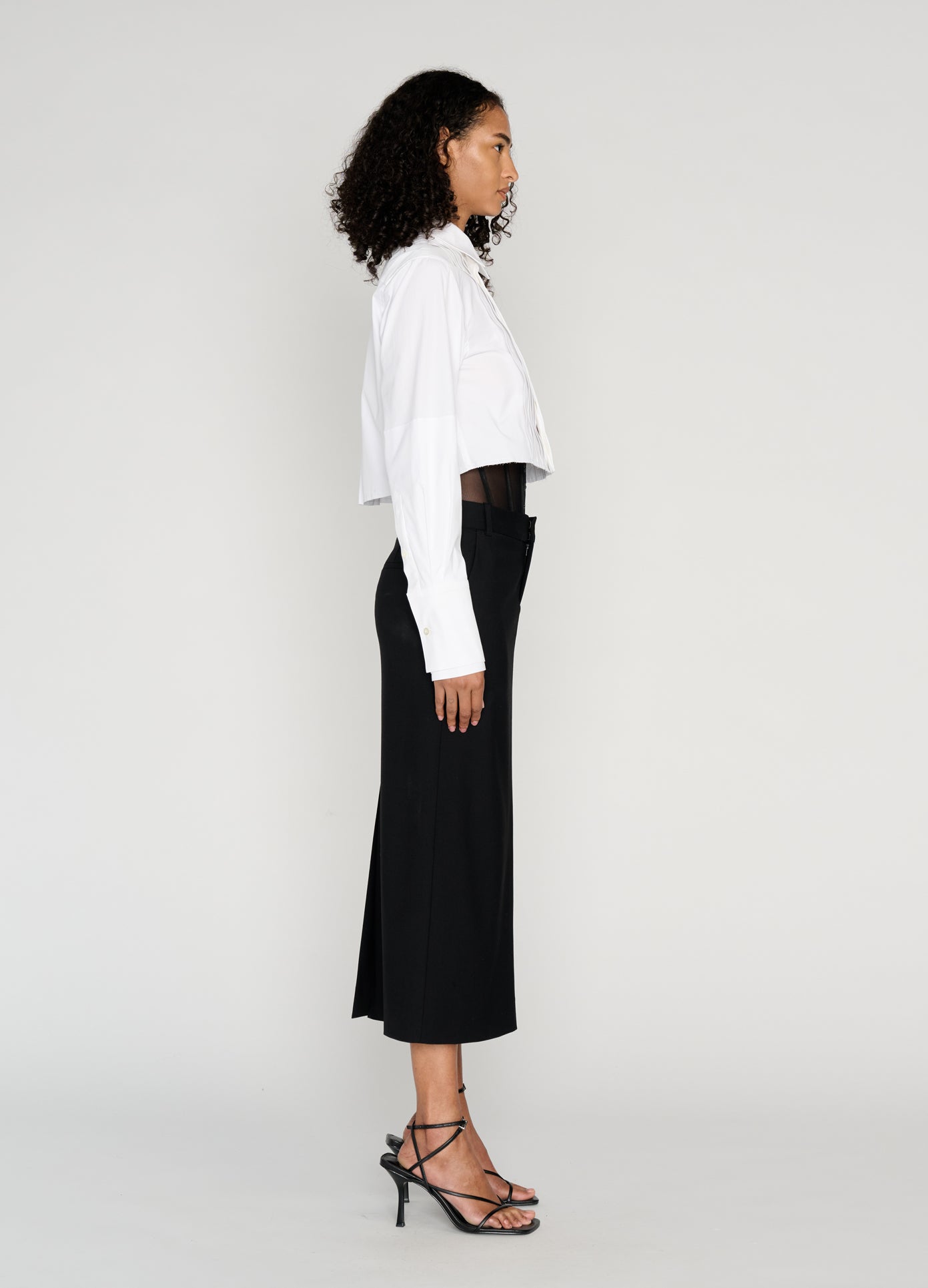 MONSE Cropped Tuxedo Shirt in ivory on model full side view