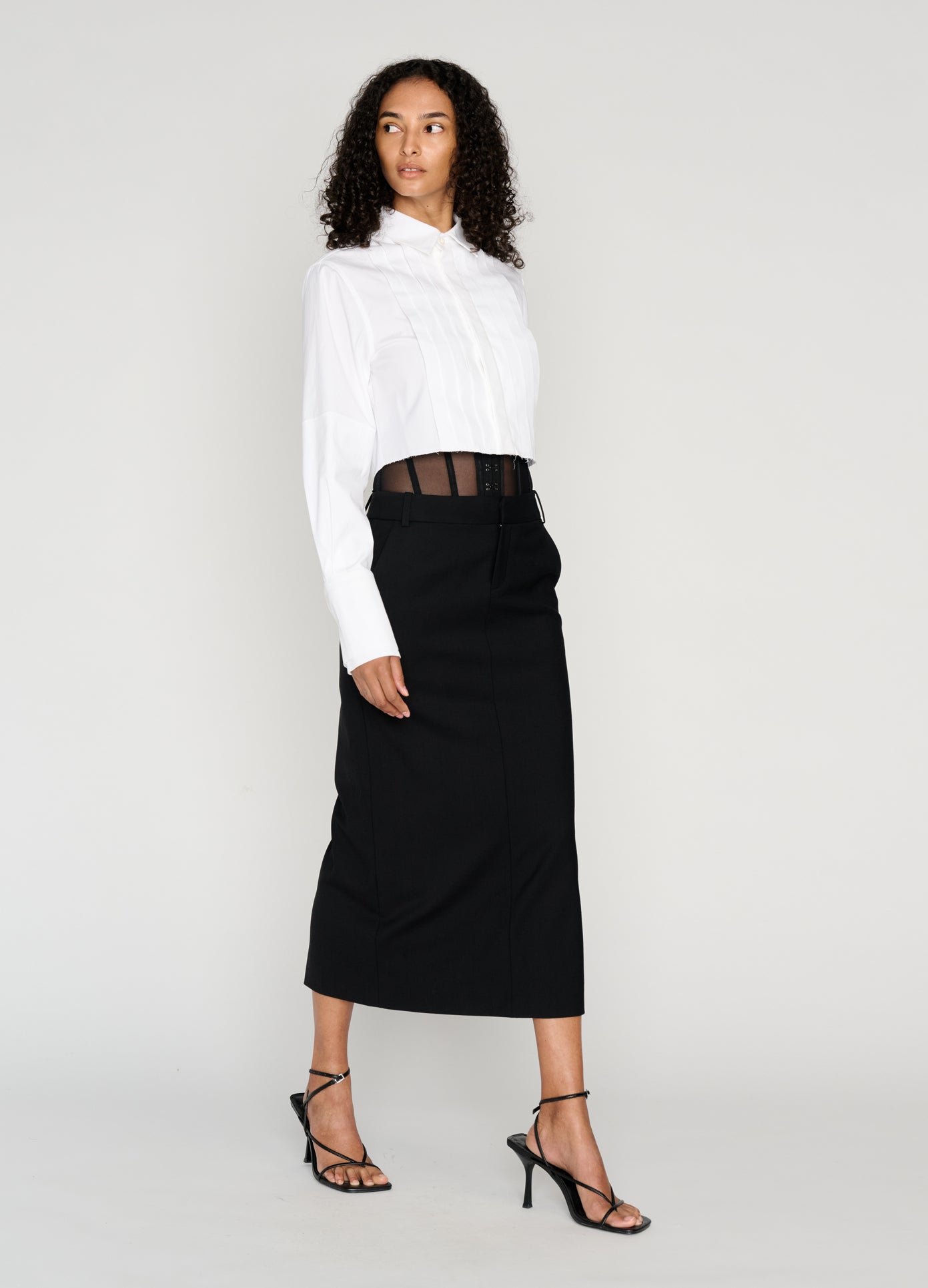 MONSE Cropped Tuxedo Shirt in ivory on model walking full front view