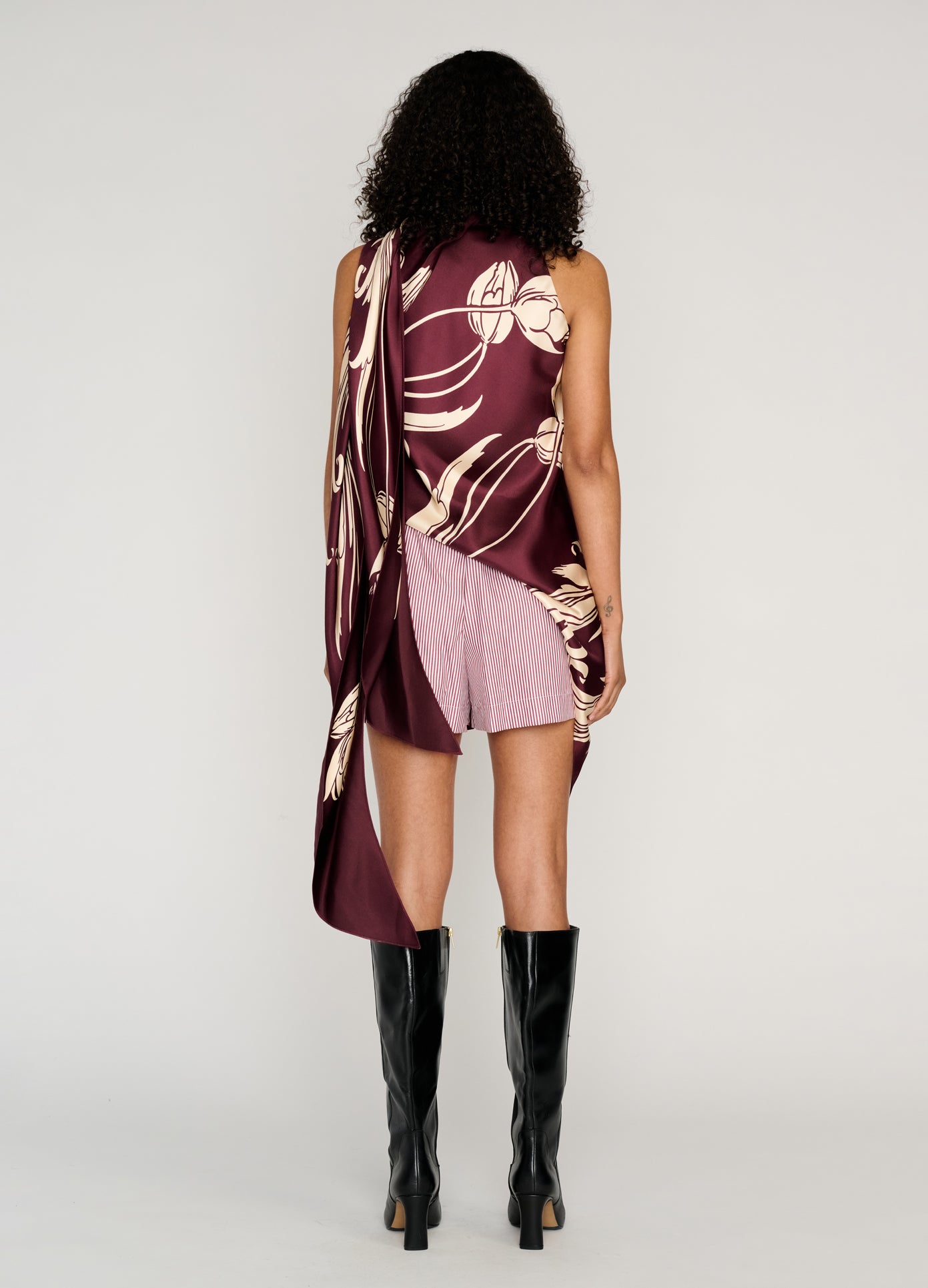 MONSE Deconstructed Combo Shorts in burgundy on model full back view