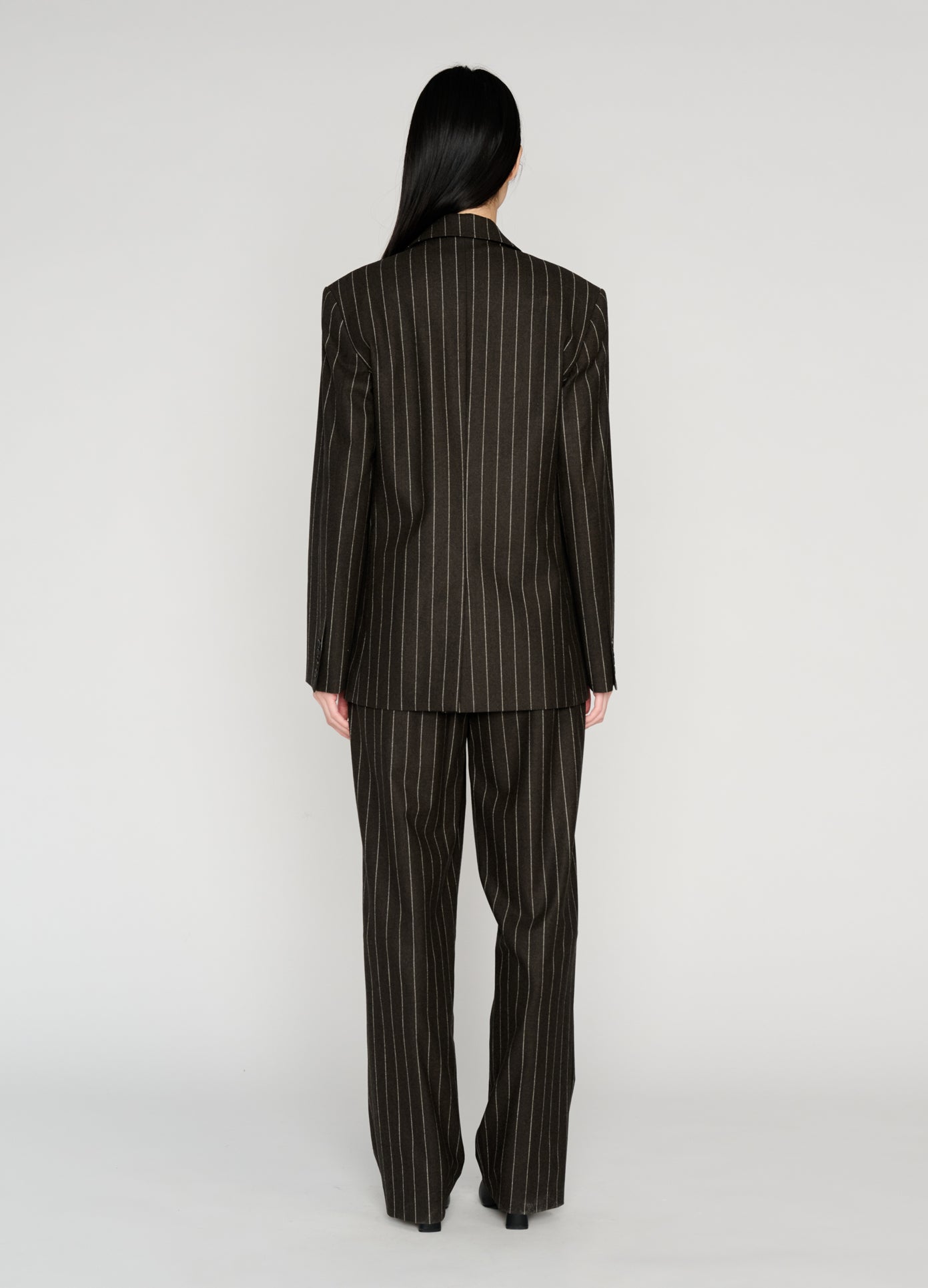 MONSE Deconstructed Lapel Tailored Jacket in brown on model full back view