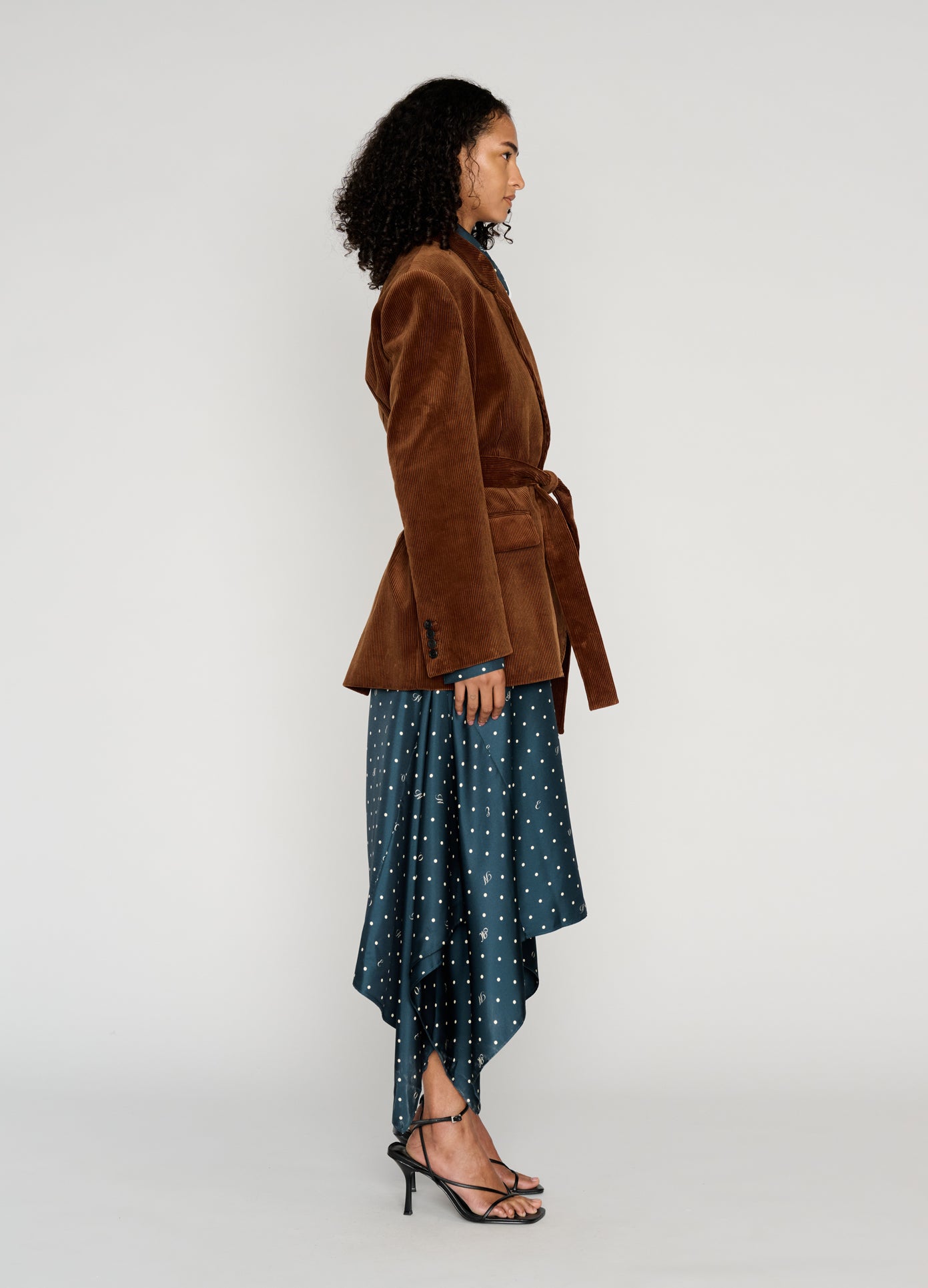 MONSE Deconstructed Lapel Tailored Jacket in brown velvet on model full side view