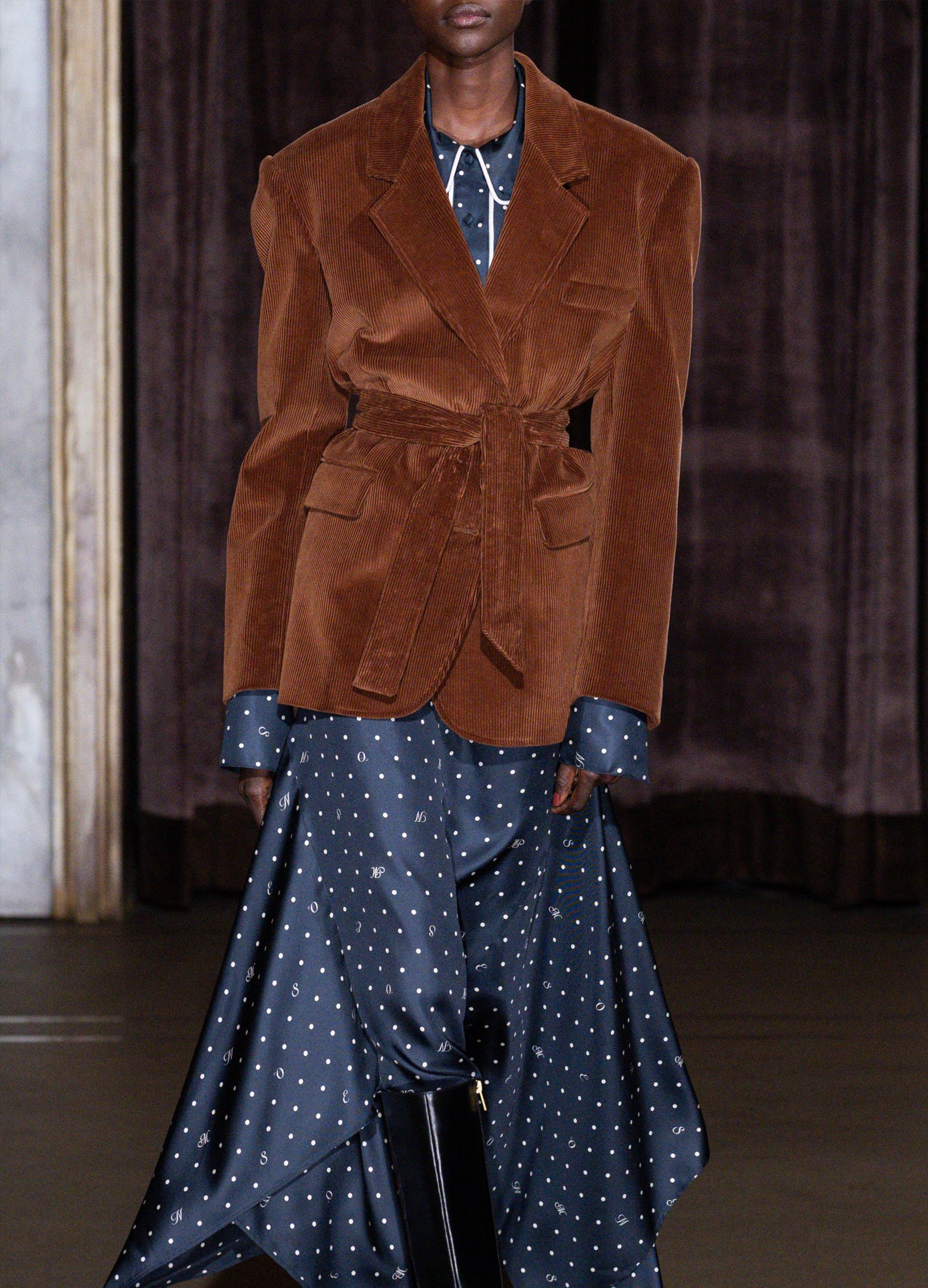MONSE Deconstructed Lapel Tailored Jacket in brown velvet on model walking runway