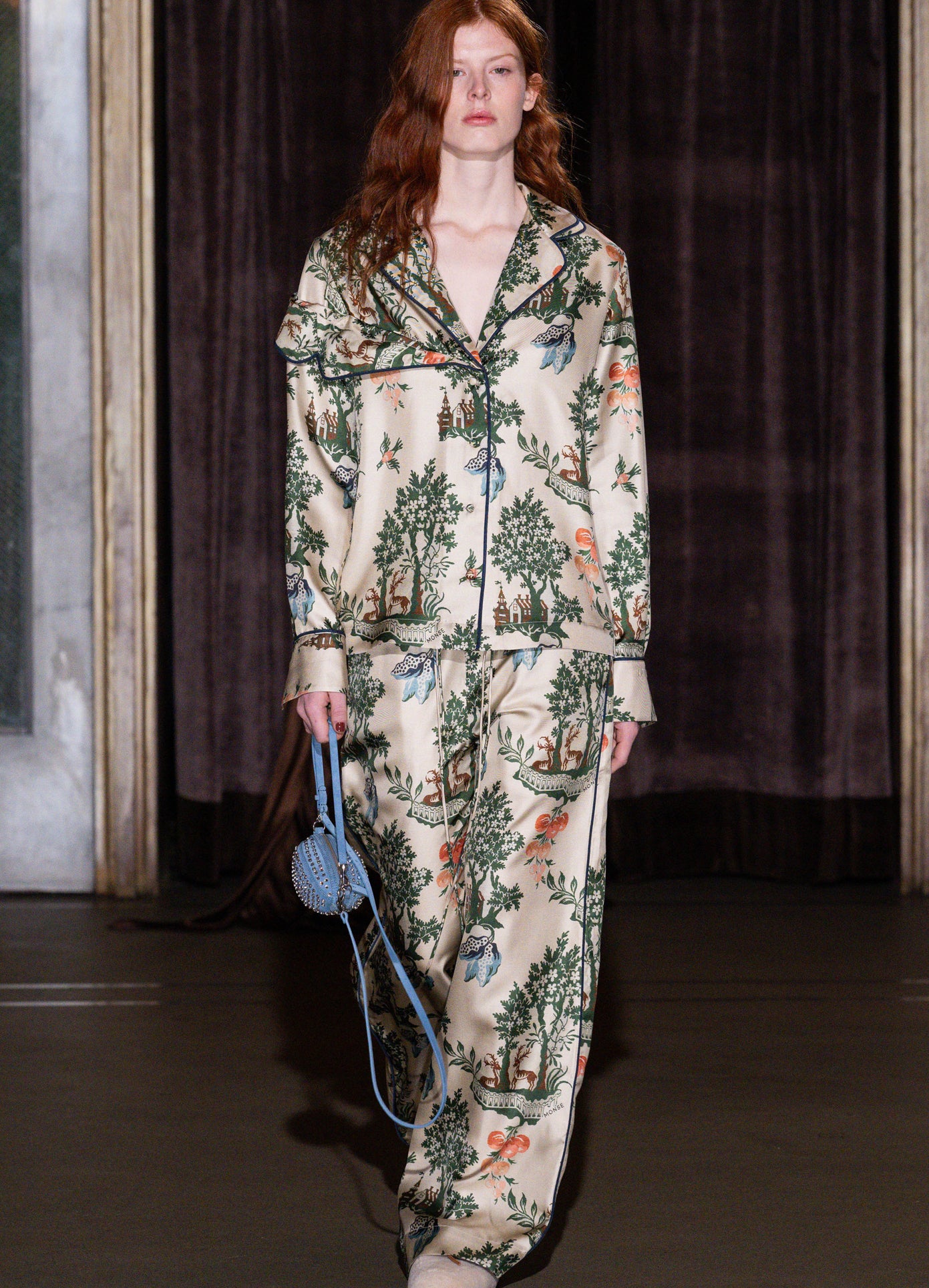 MONSE Deconstructed Pajama Top in burgundy and white on runway model walking show full front view 