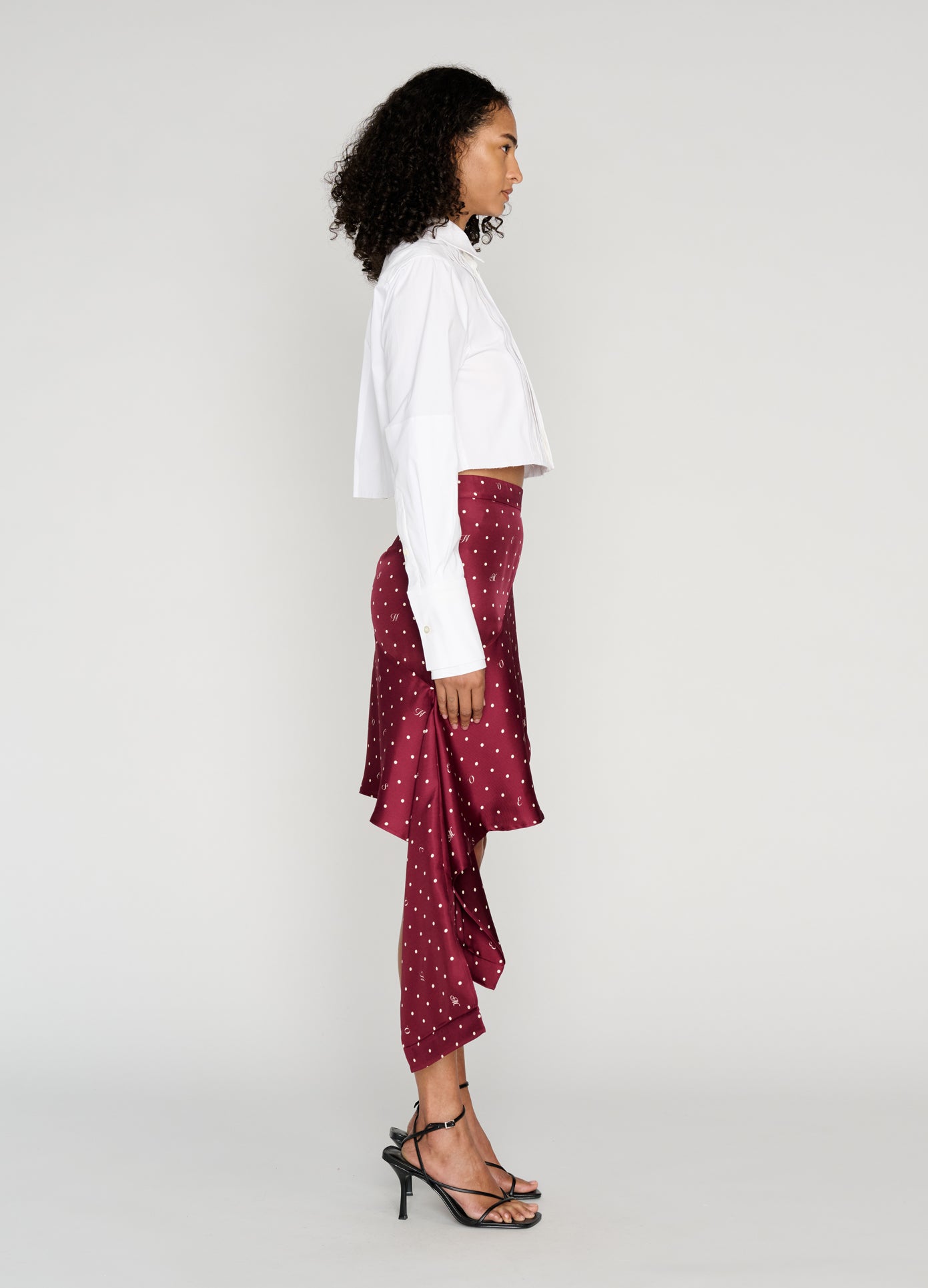 MONSE Deconstructed Pajamas Skirt in burgundy on model full side view