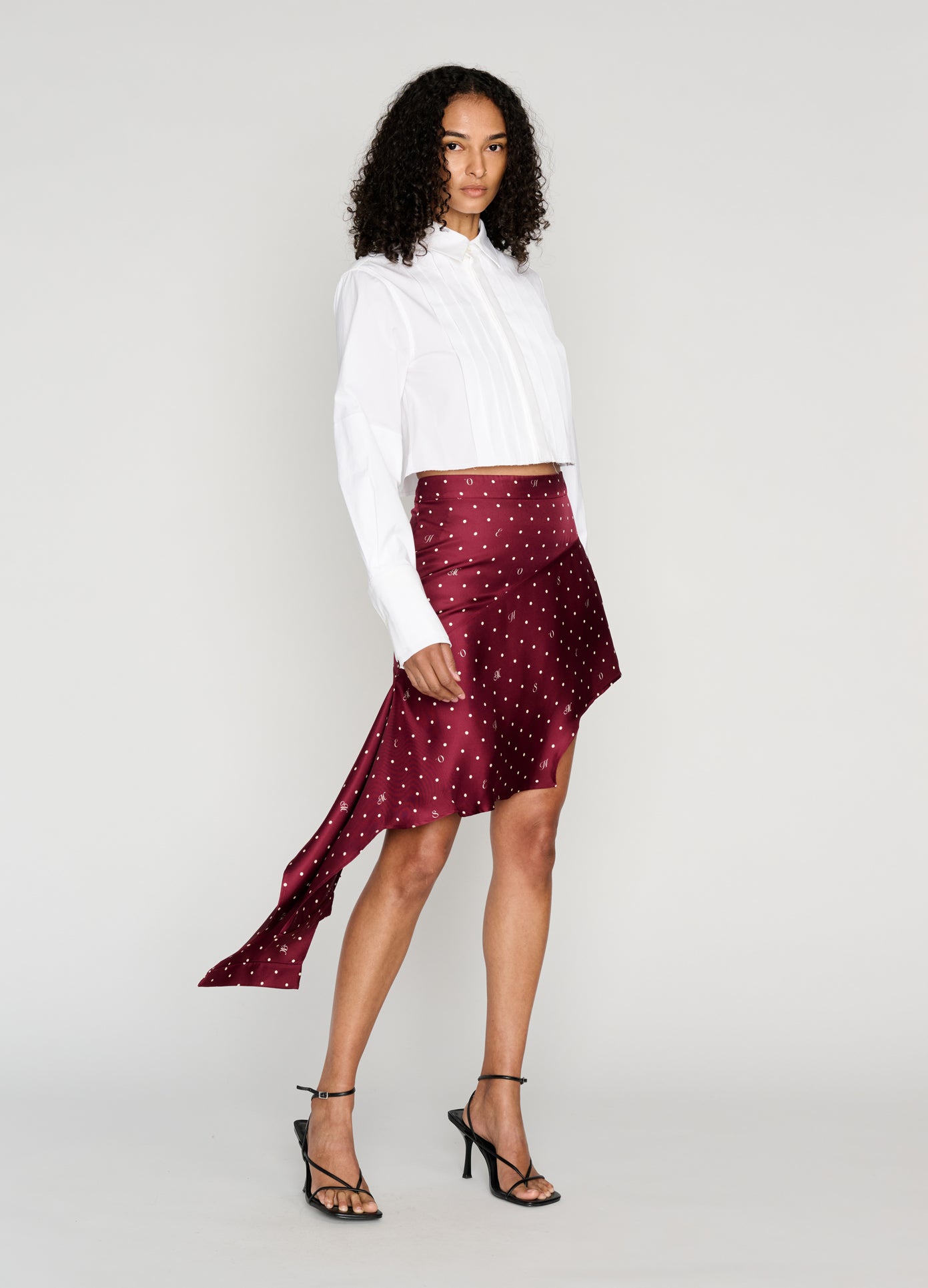 MONSE Deconstructed Pajamas Skirt in burgundy on model style full front view