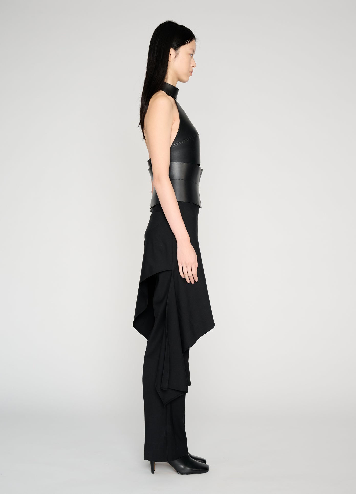MONSE Deconstructed Tailored Skirt Trousers in black on model full side view