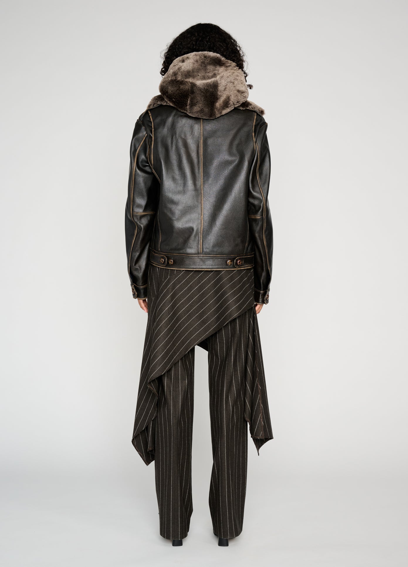 MONSE Deconstructed Tailored Skirt Trousers in brown on model full back view