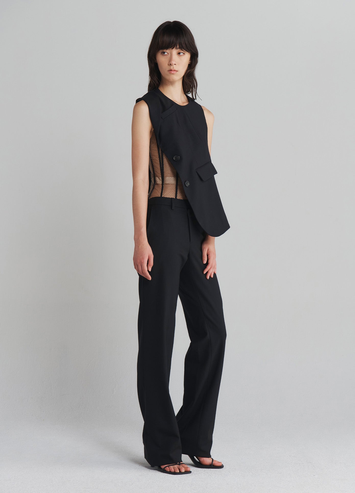 MONSE Deconstructed Tailored Top in Black on model full side view