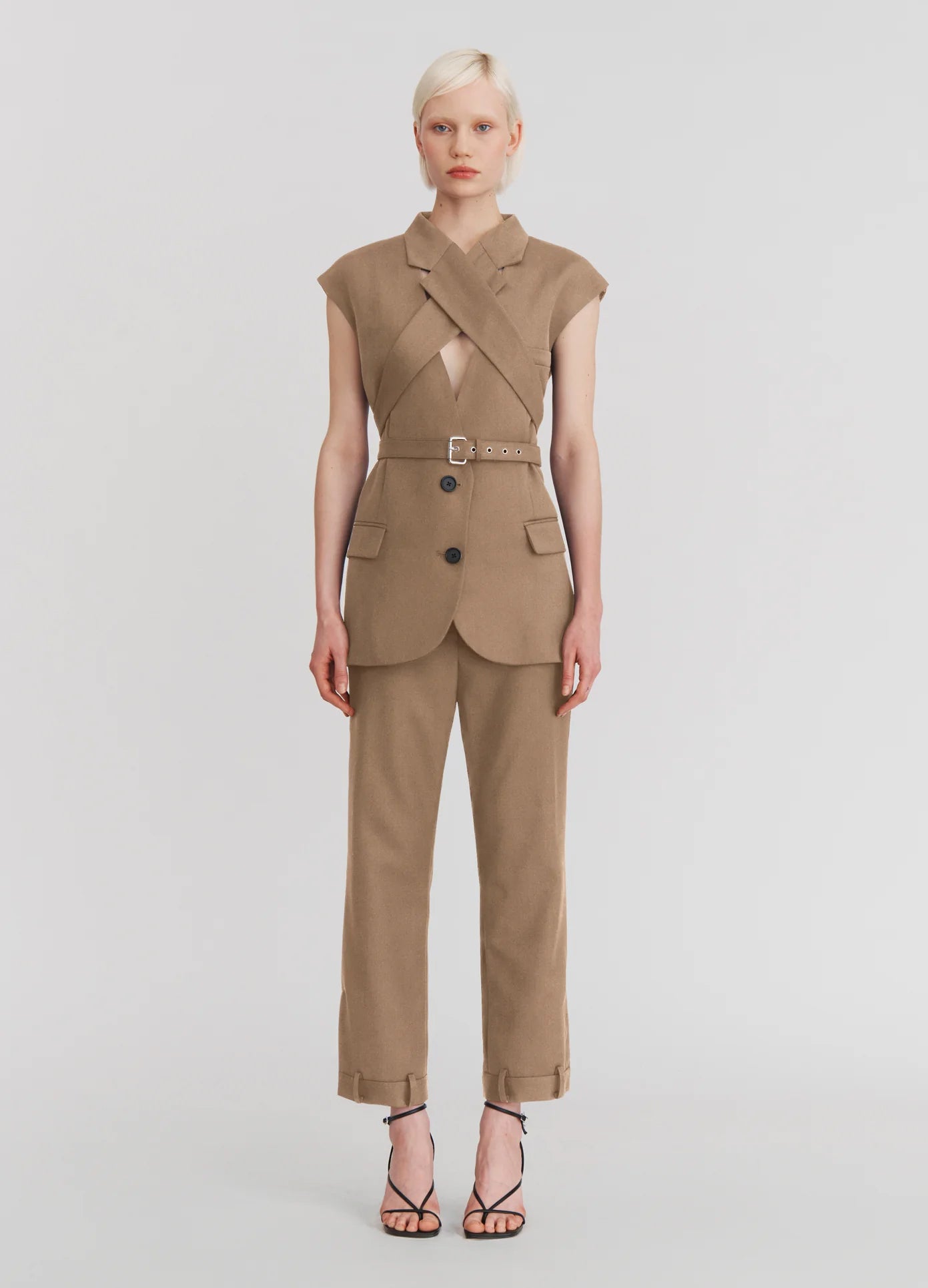 MONSE Deconstructed Tuxedo Trousers in Beige on model front view